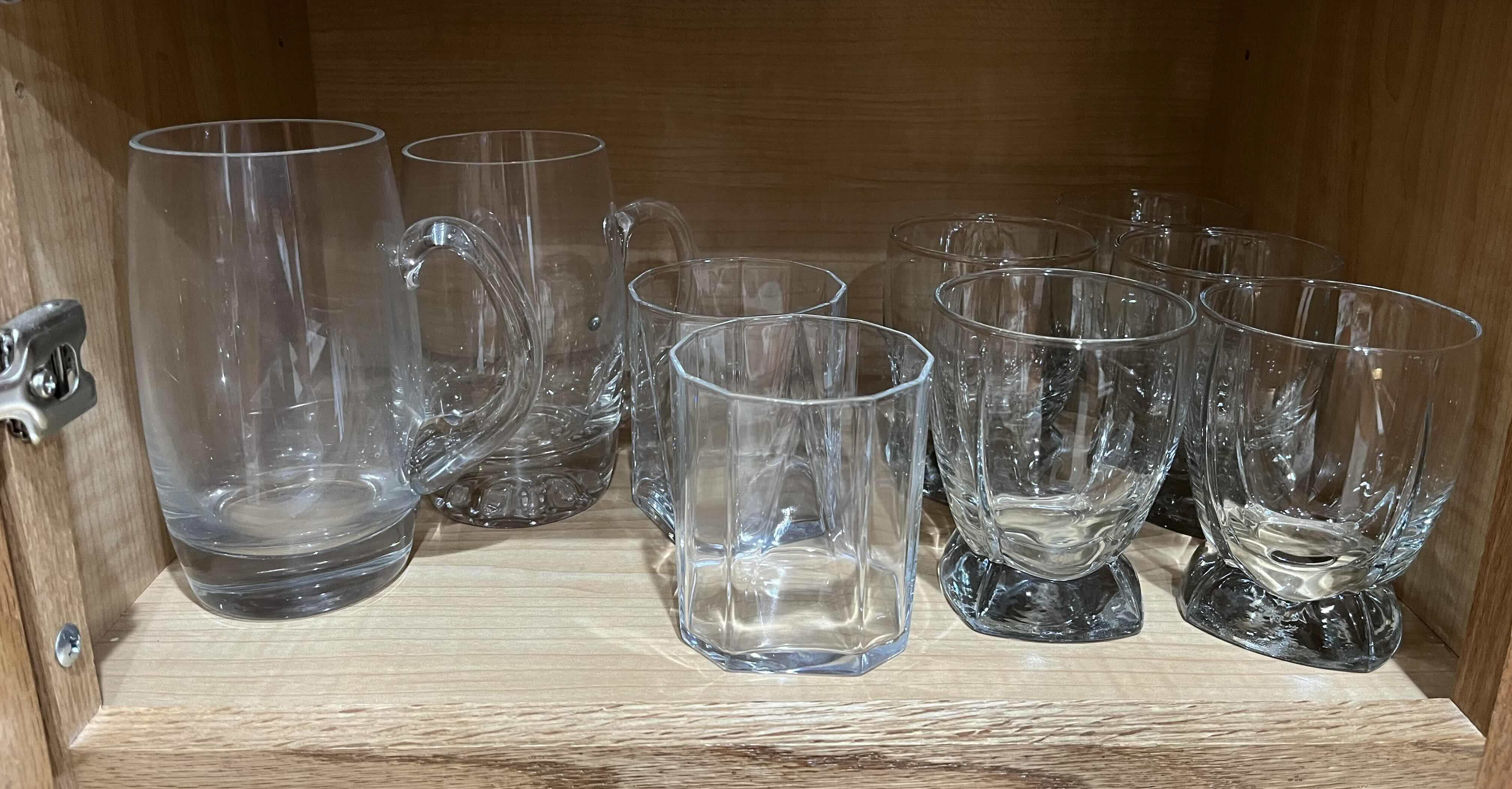 Photo 2 of CONTENTS OF CABINET-COCKTAIL & DRINKING GLASSWARE (22) W STAINLESS STEEL MIXER