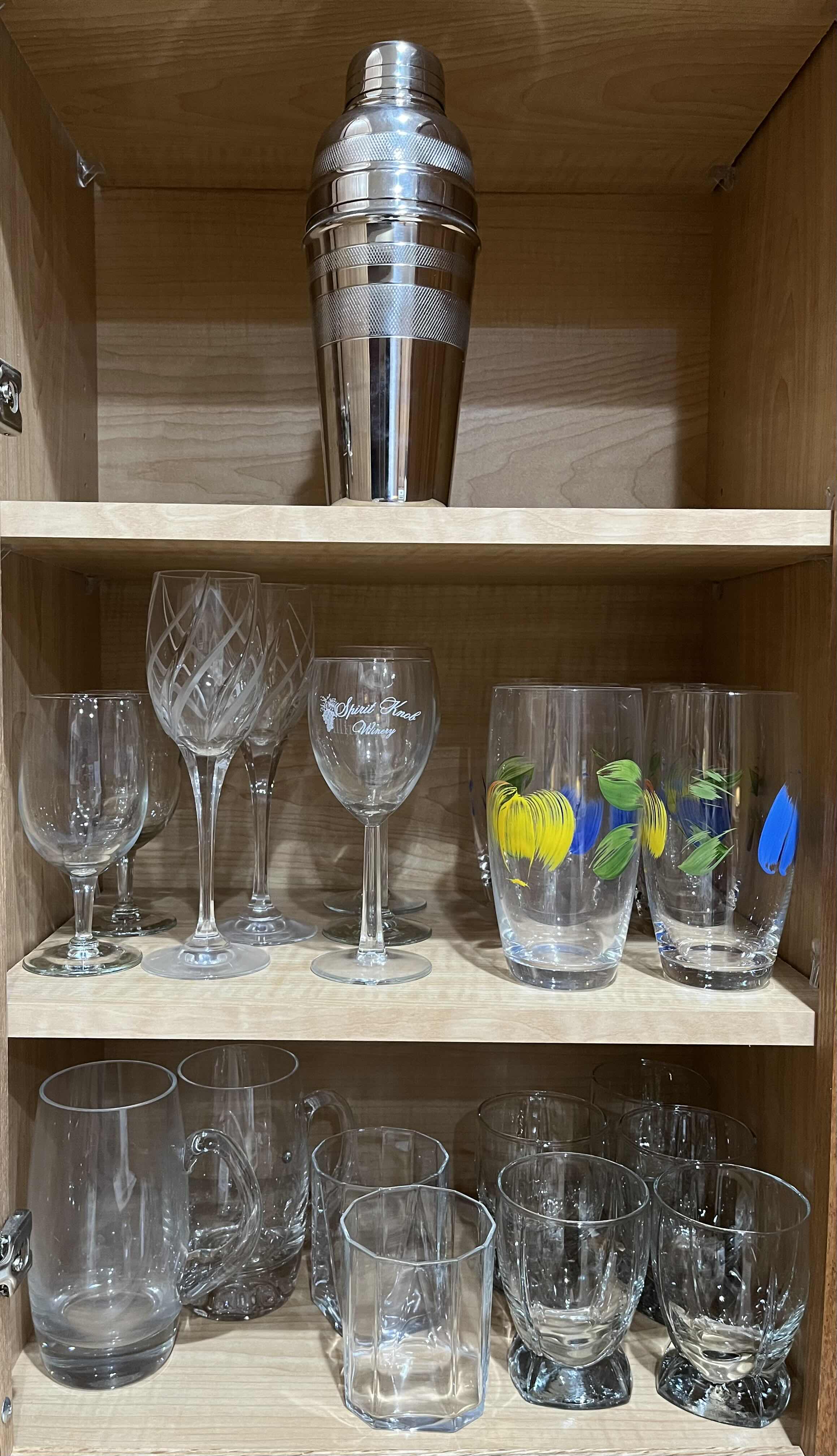 Photo 1 of CONTENTS OF CABINET-COCKTAIL & DRINKING GLASSWARE (22) W STAINLESS STEEL MIXER