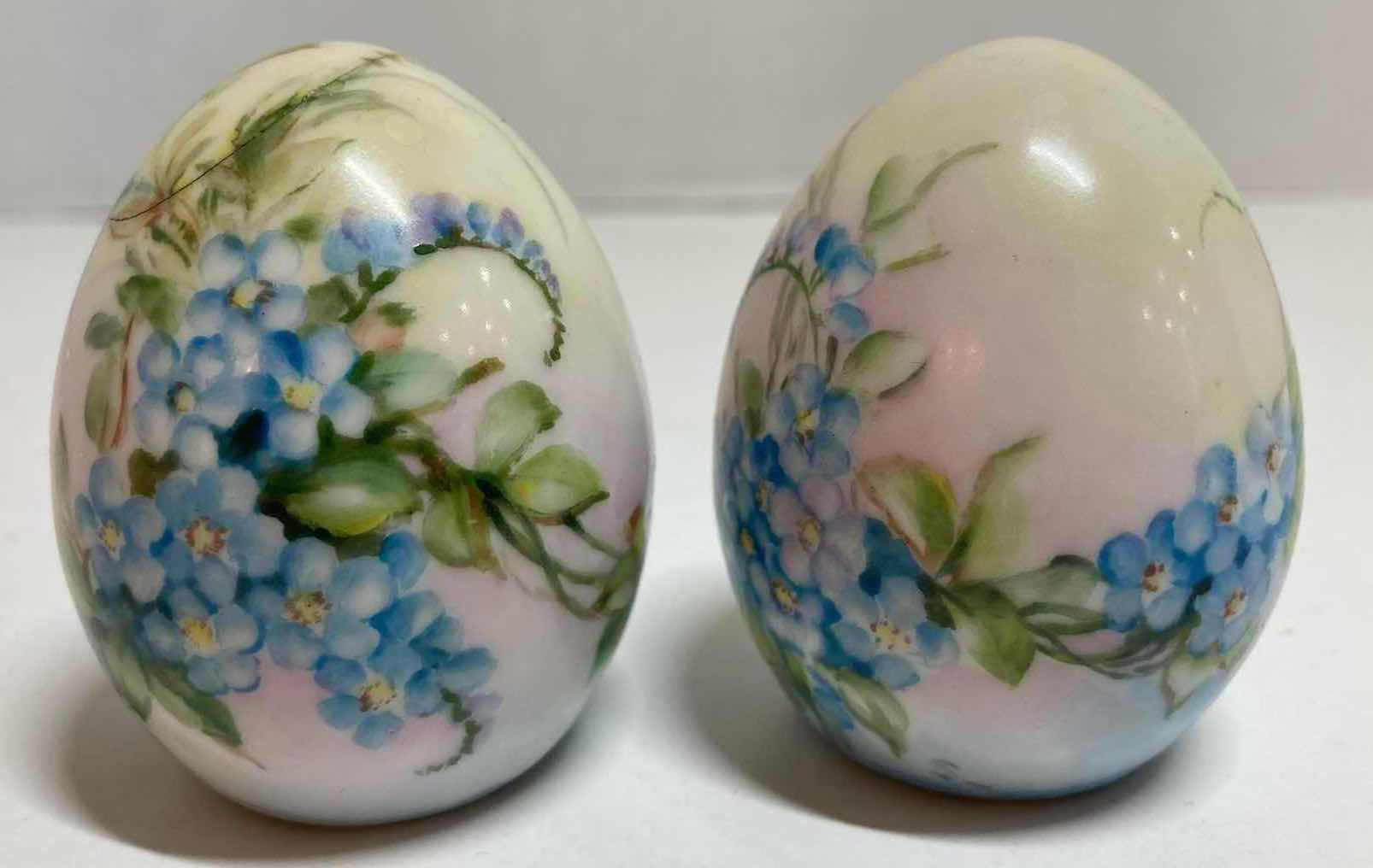 Photo 1 of GERMAN HAND PAINTED BLUE FLORAL PORCELAIN EGG-SHAPED SALT AND PEPPER SHAKER H2.5”
