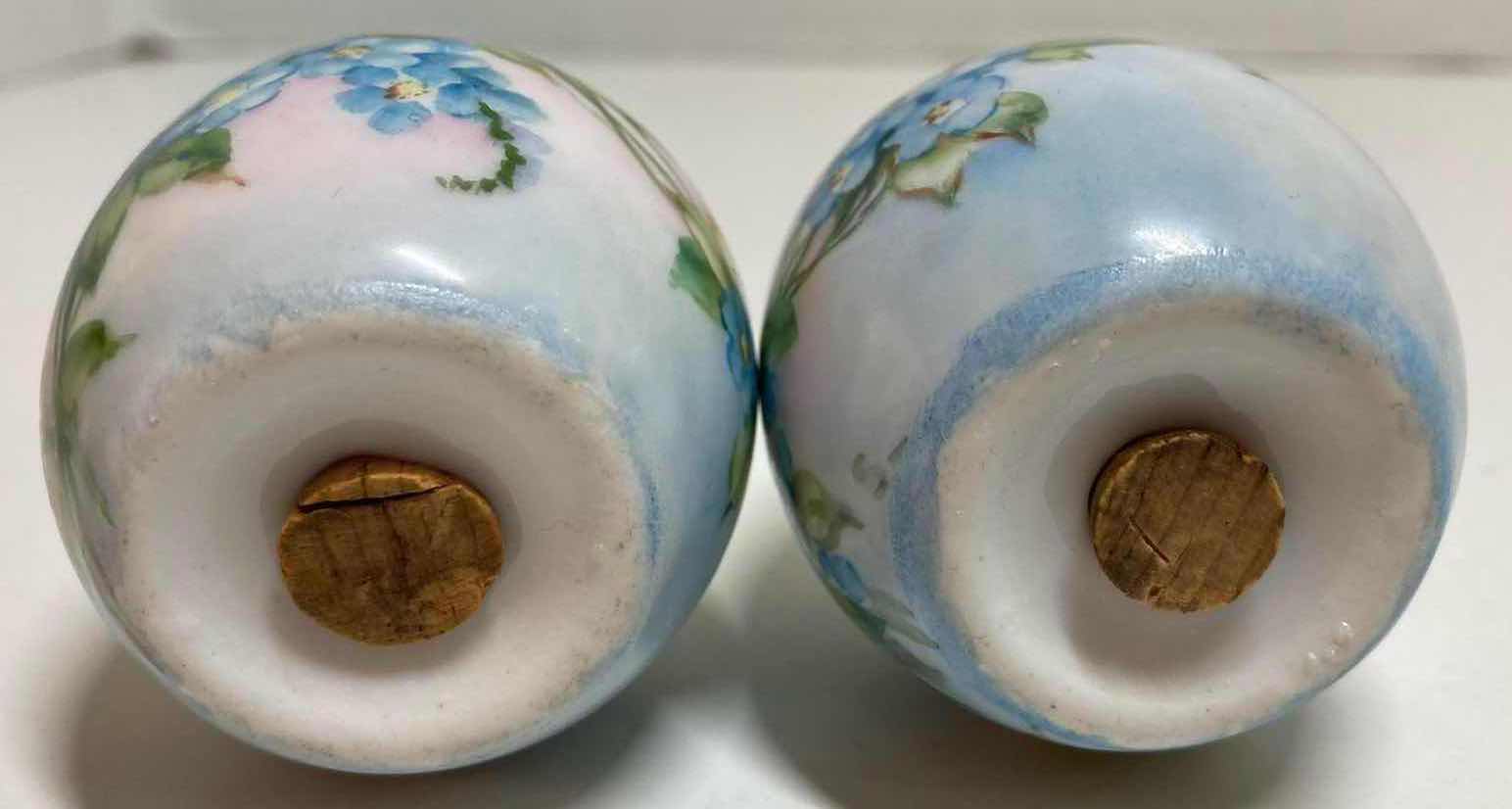 Photo 1 of GERMAN HAND PAINTED BLUE FLORAL PORCELAIN EGG-SHAPED SALT AND PEPPER SHAKER H2.5”