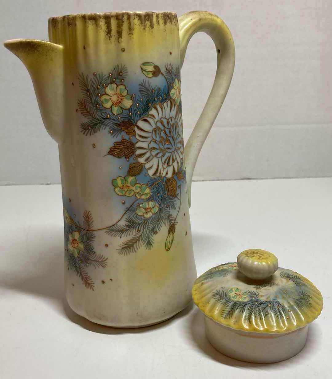 Photo 1 of HAND PAINTED YELLOW/BLUE FLORAL CERAMIC TEA POT H9.25”