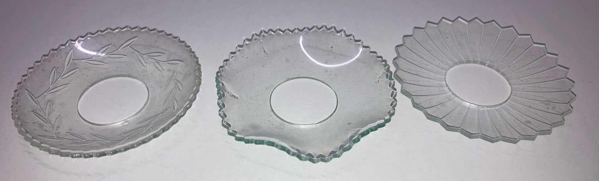 Photo 1 of CLEAR GLASS CANDLE WAX DRIP CATCHER (12).  2.75”