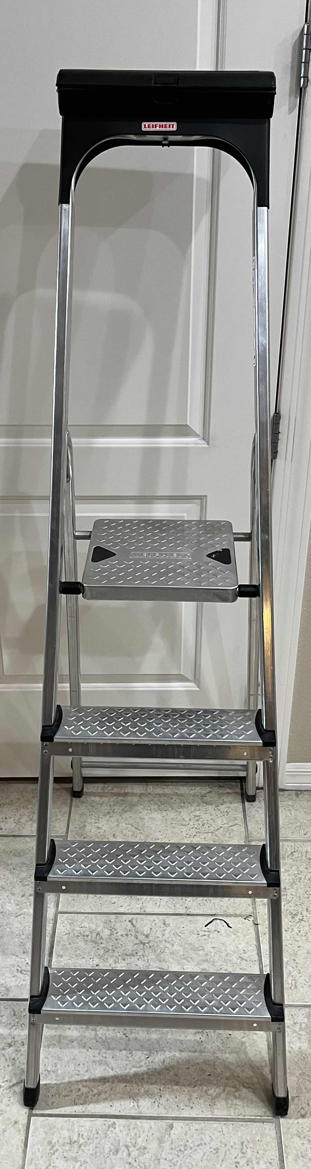 Photo 1 of LEIFHEIT STEP LADDER W TOOL BOX 17” X 61.5”