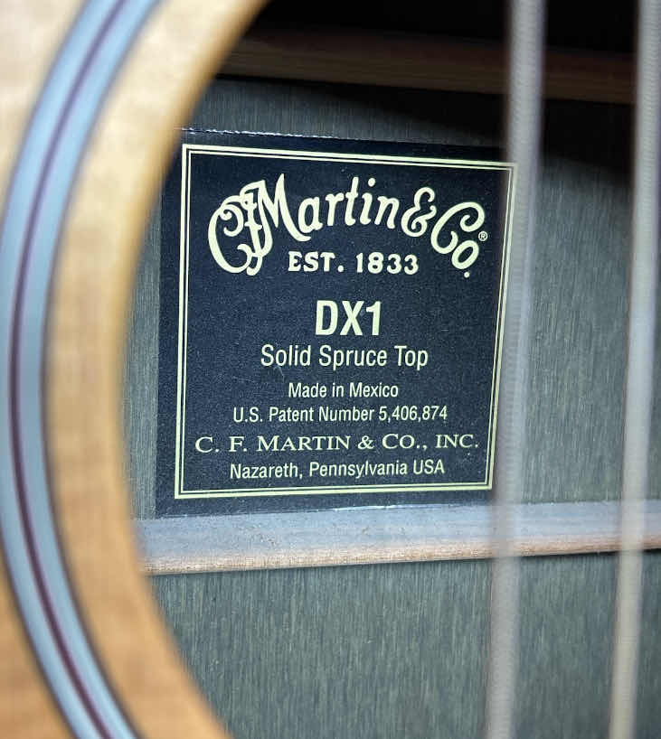 Photo 1 of MARTIN & CO DX1 SOLID SPRUCE TOP ACOUSTIC GUITAR W PROPER CARE INSTRUCTION MANUAL & NEW ACOUSTIC SP PHOSPHOR BRONZE GUITAR STRINGS (LIGHT .012 - .054, MSP4100) 