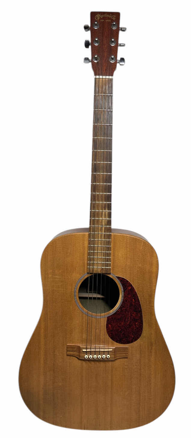 Photo 1 of MARTIN & CO DX1 SOLID SPRUCE TOP ACOUSTIC GUITAR W PROPER CARE INSTRUCTION MANUAL & NEW ACOUSTIC SP PHOSPHOR BRONZE GUITAR STRINGS (LIGHT .012 - .054, MSP4100) 