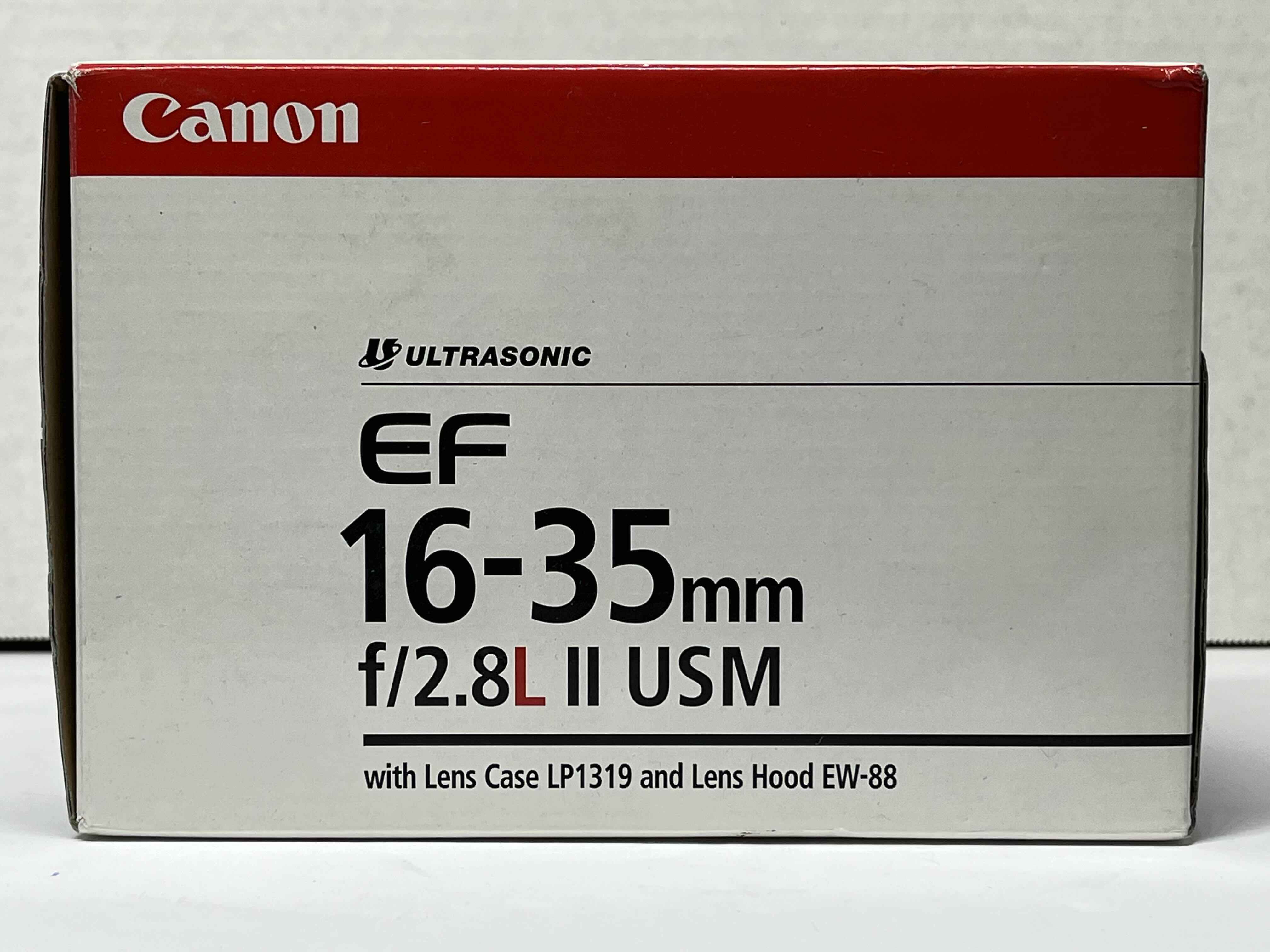 Photo 1 of CANON ULTRASONIC HSM EF 16-35MM F/2.8L II CAMERA LENS W CANON LENS HOOD MODEL EW-88