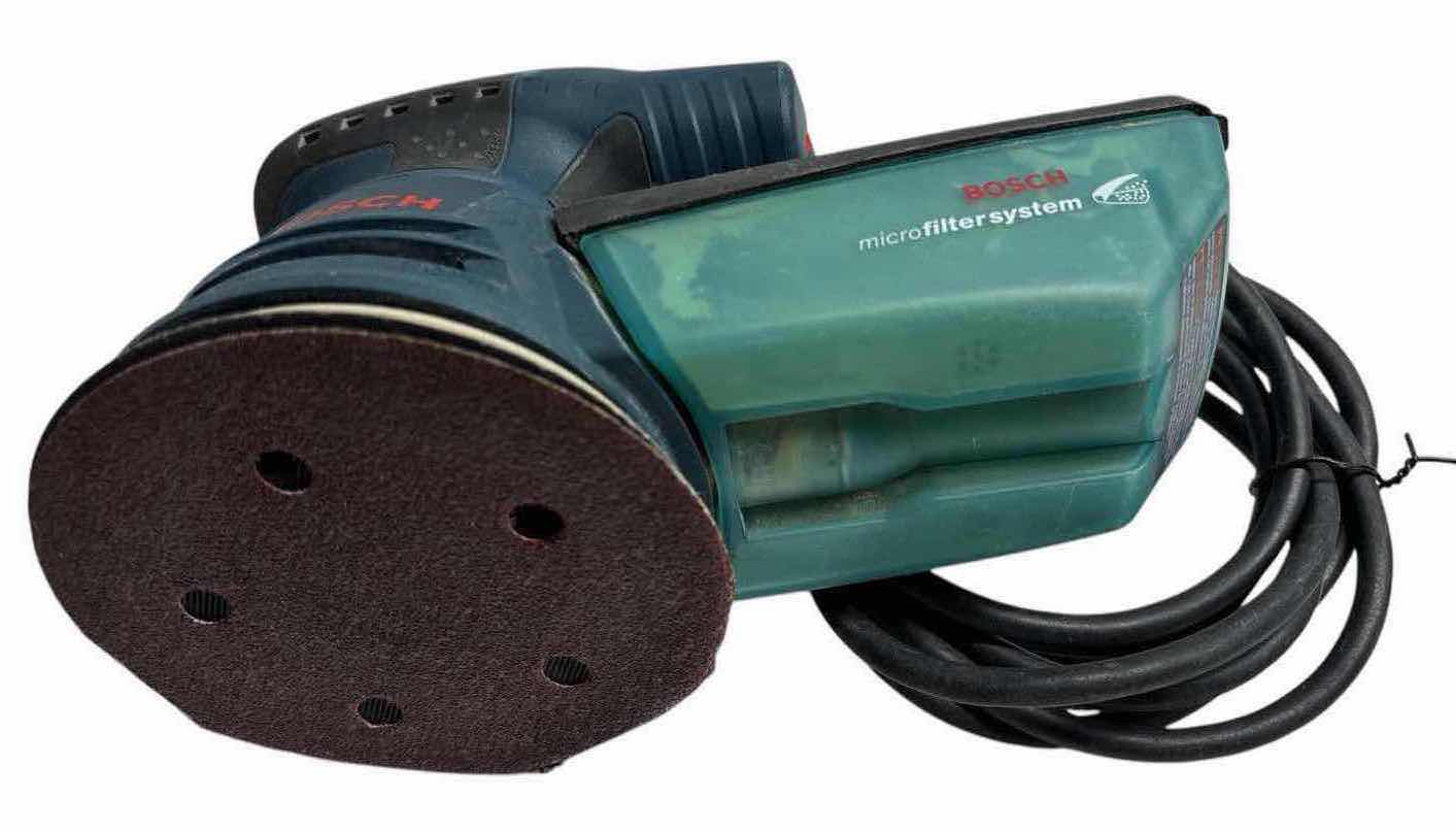 Photo 1 of BOSCH 2.5 AMP 5” CORDED VARIABLE SPEED PALM SANDER W DUST COLLECTOR (ROS20VS) & 4-PACKS OF VARIOUS SANDING DISCS