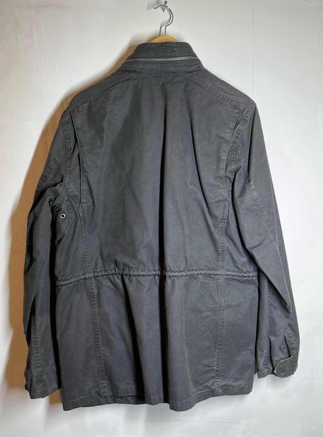 Photo 1 of BLACK HOODED CARGO JACKET MENS SIZE LG
