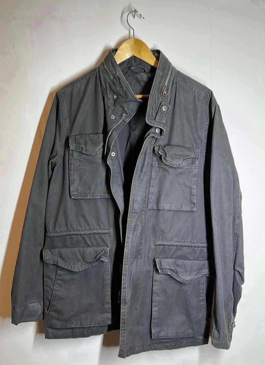 Photo 1 of BLACK HOODED CARGO JACKET MENS SIZE LG