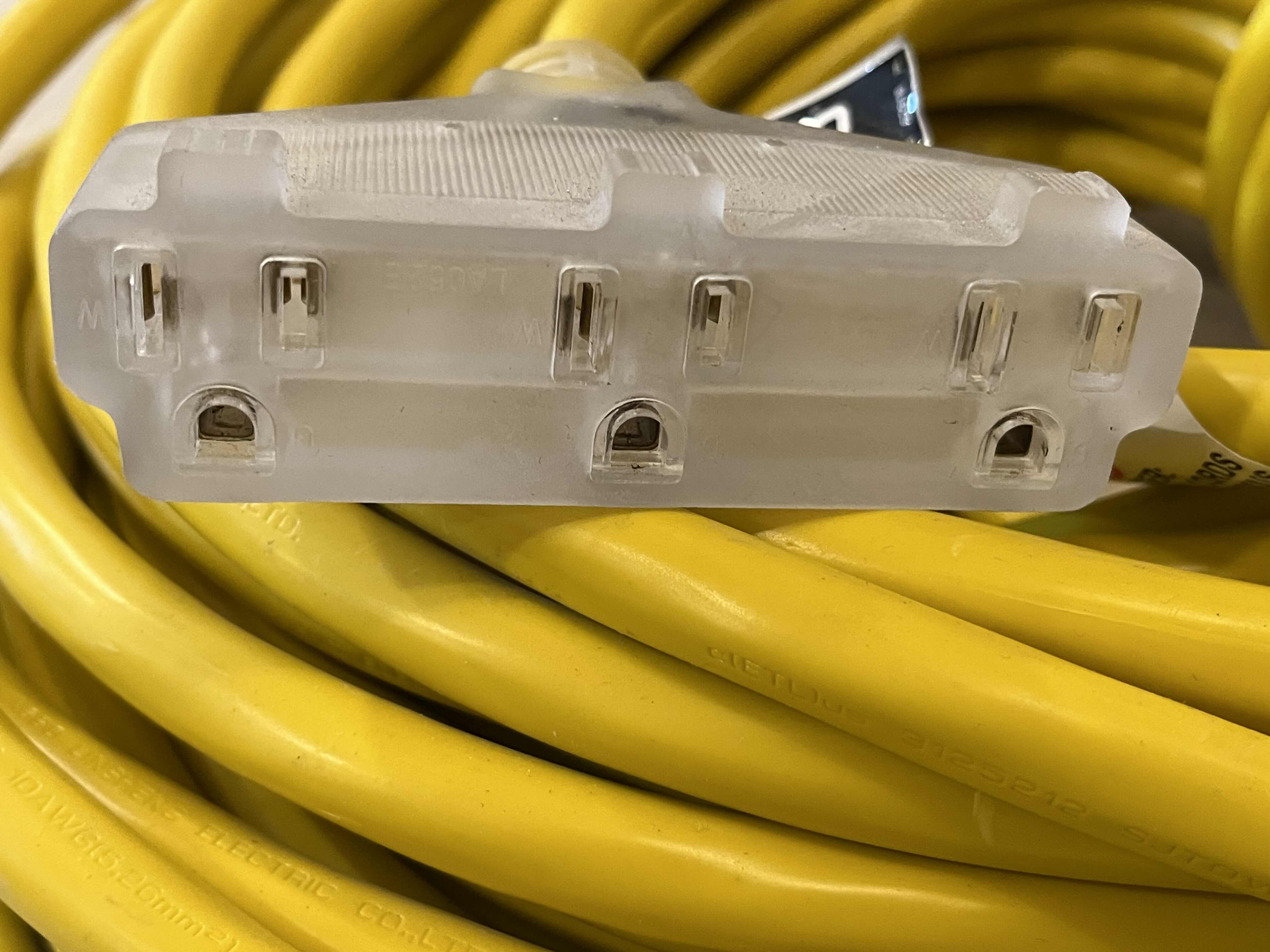 Photo 1 of VANGUARD TRIPLE TAP 10/3 GAUGE EXTENSION CORD 100’