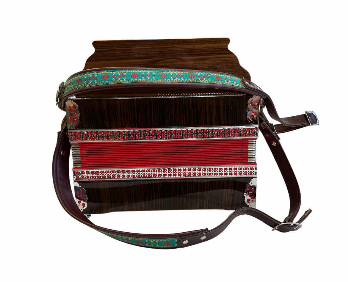 Photo 1 of MELODIJA MENNGES 3 ROW STEIRICHE DIATONIC 34 TREBLE & 11 HELIKON BASS BUTTONS ACCORDION W VINTAGE HARD CASE & MUSIC BOOKS