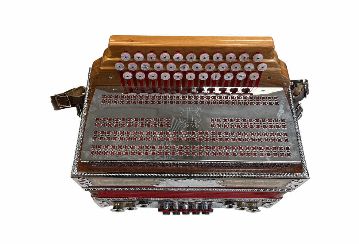 Photo 1 of MELODIJA MENNGES 3 ROW STEIRICHE DIATONIC 34 TREBLE & 11 HELIKON BASS BUTTONS ACCORDION W VINTAGE HARD CASE & MUSIC BOOKS