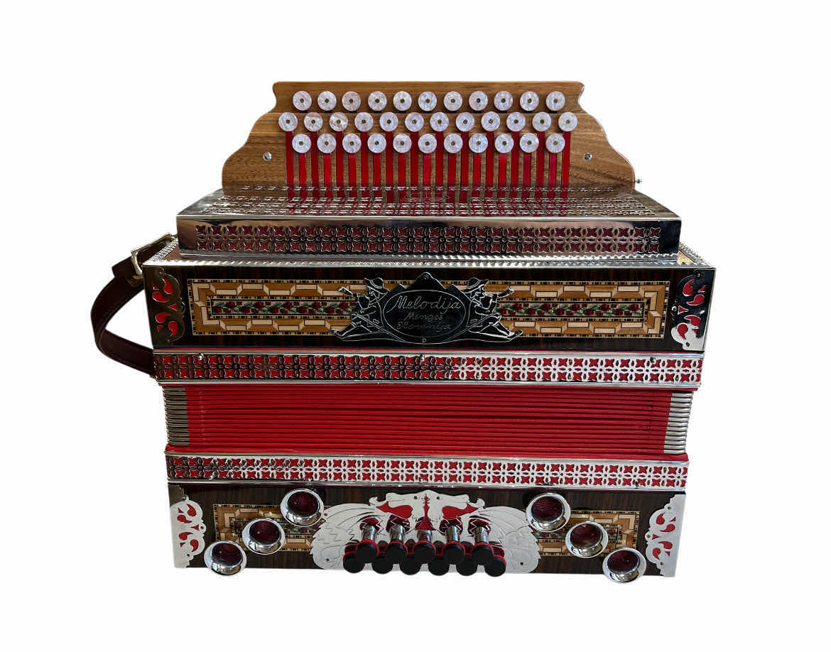 Photo 1 of MELODIJA MENNGES 3 ROW STEIRICHE DIATONIC 34 TREBLE & 11 HELIKON BASS BUTTONS ACCORDION W VINTAGE HARD CASE & MUSIC BOOKS