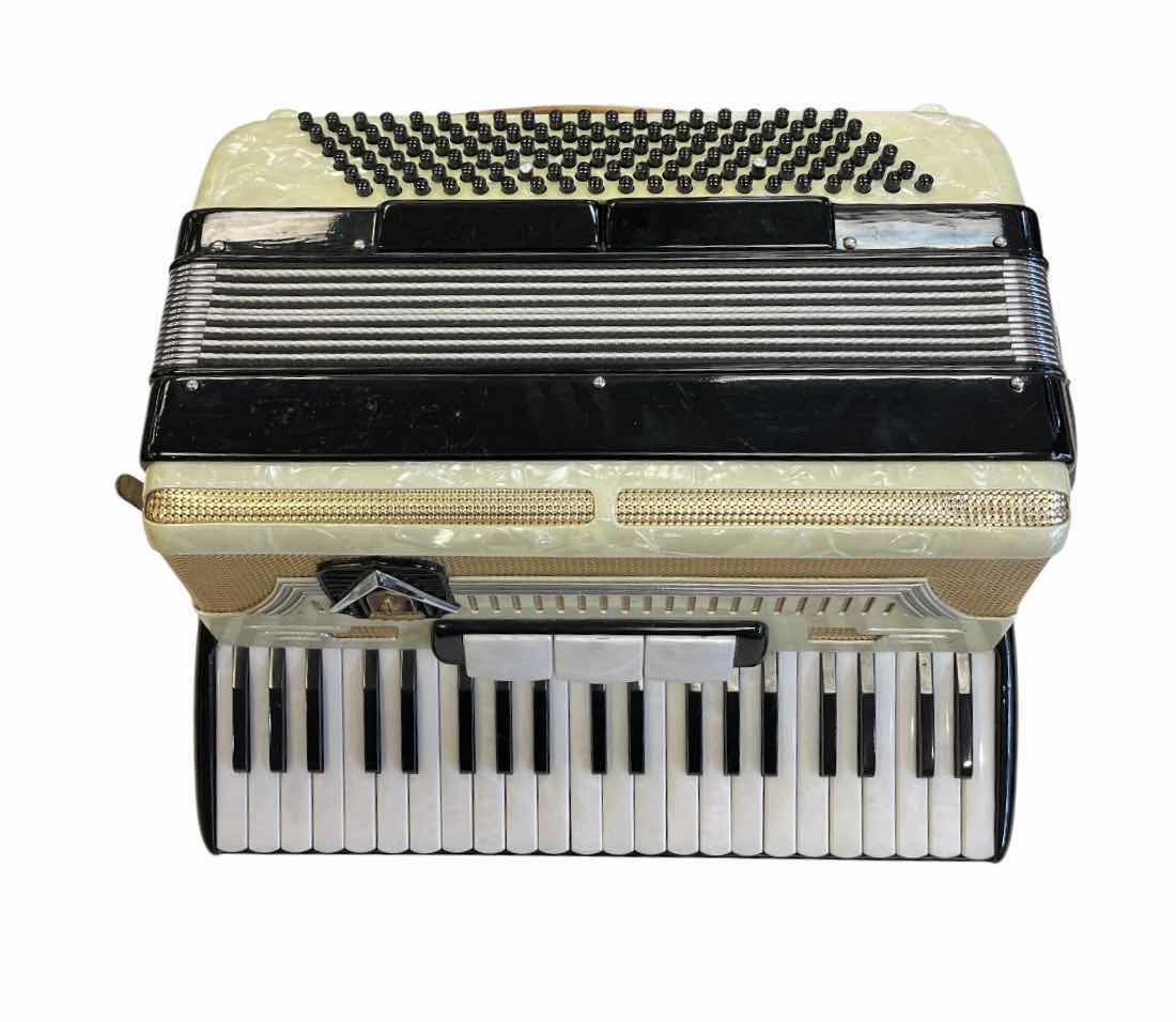 Photo 1 of FRONTALINI PIANO ACCORDION W ORIGINAL LEATHER HARD CASE & MUSIC BOOKS