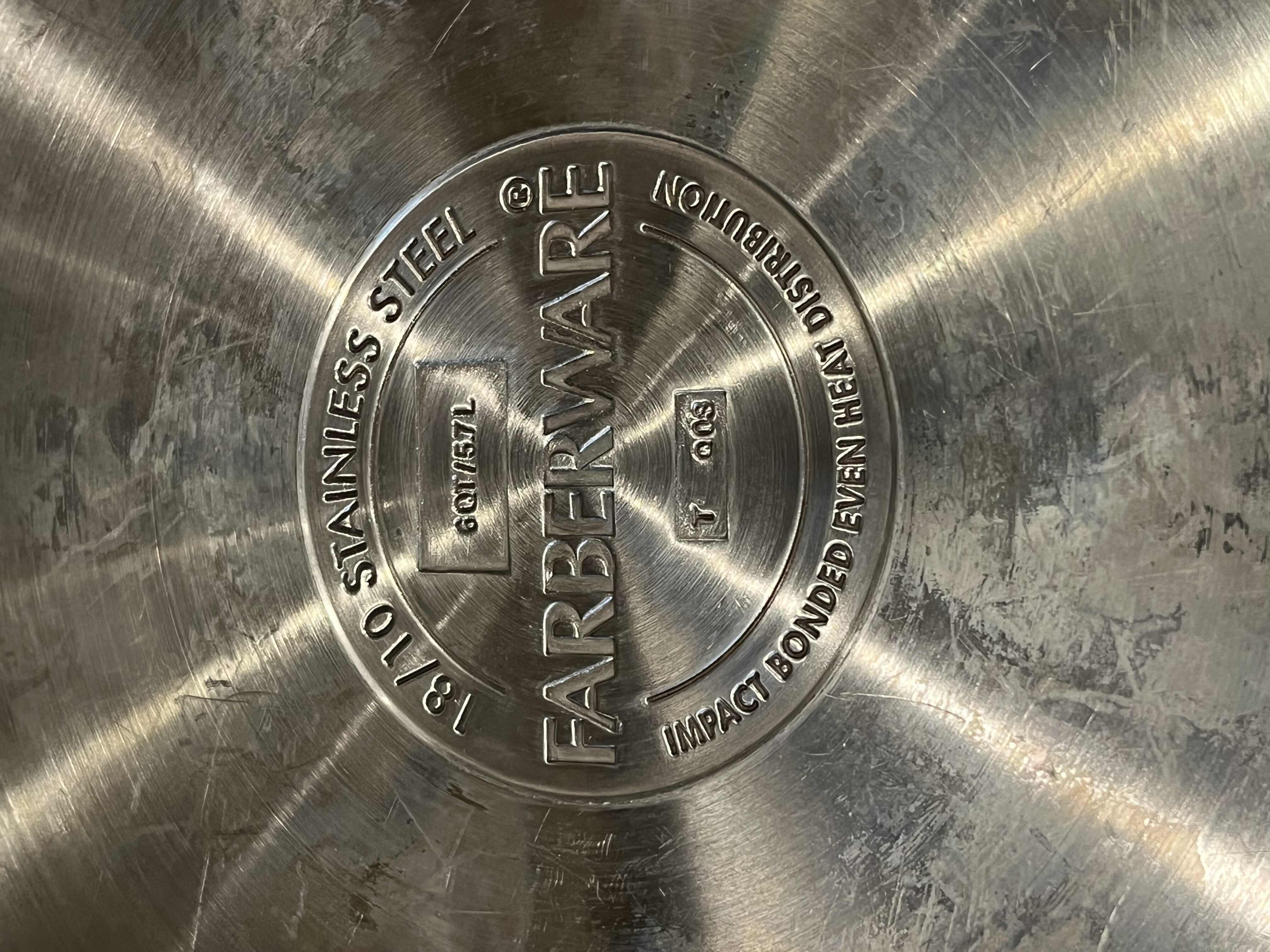 Photo 1 of FABERWARE 6QT STAINLESS STEEL SAUCE PAN W LID & STAINLESS STEEL 11.75” COLANDER STRAINER