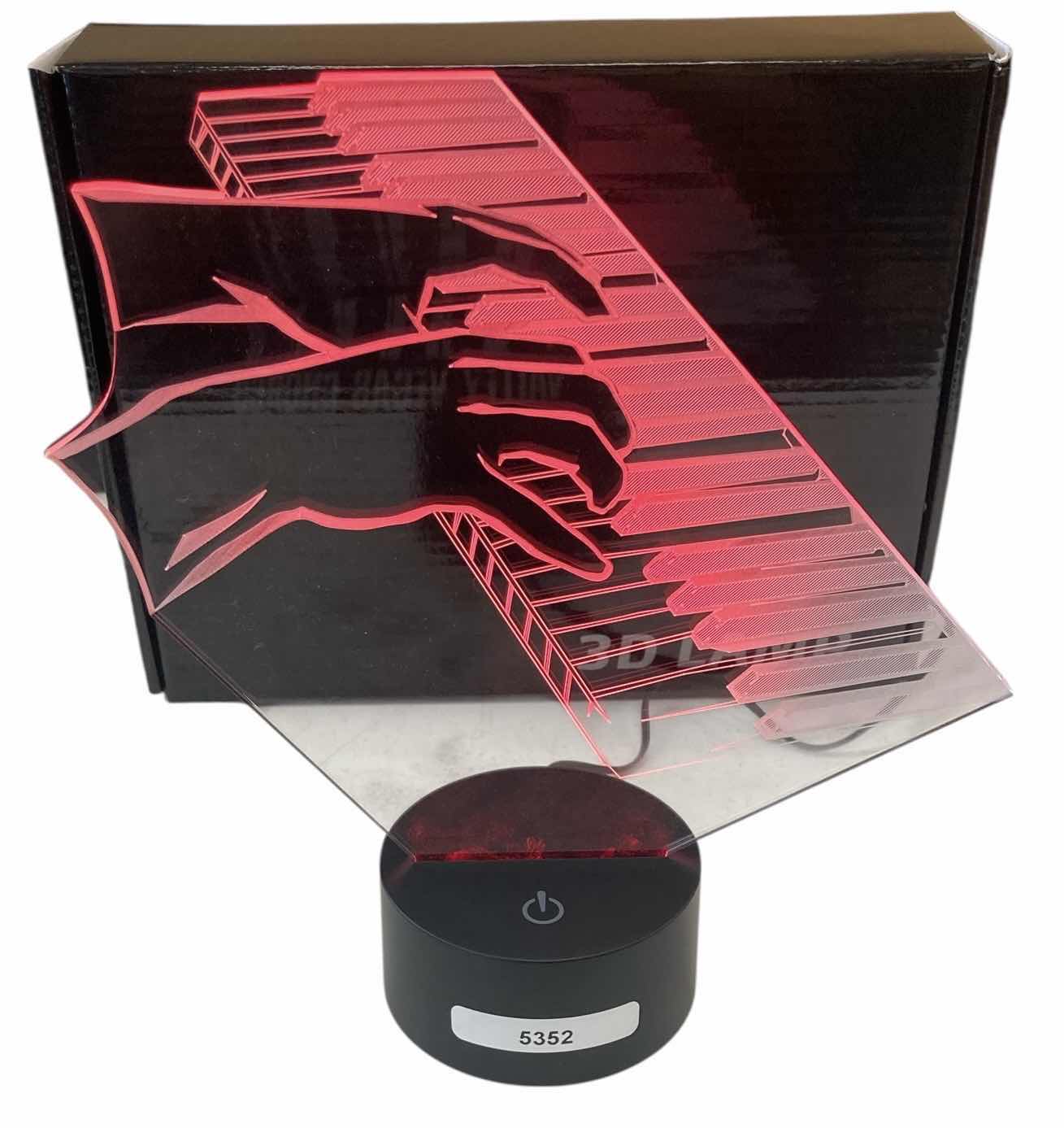 Photo 1 of NEW PIANO KEYBOARD W HANDS 3D LAMP H9”