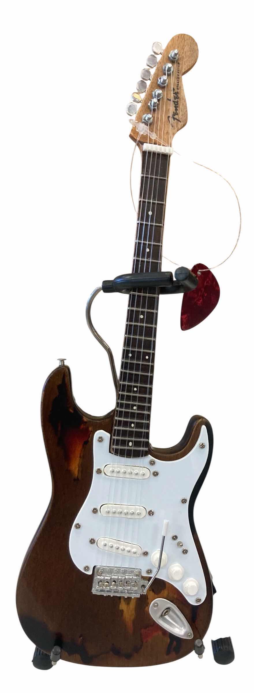 Photo 1 of FENDER BY AXE HEAVEN MINIATURE GUITARS FENDER STRAT RORY AGED SUNBURST ELECTRIC GUITAR W STAND H9.5”