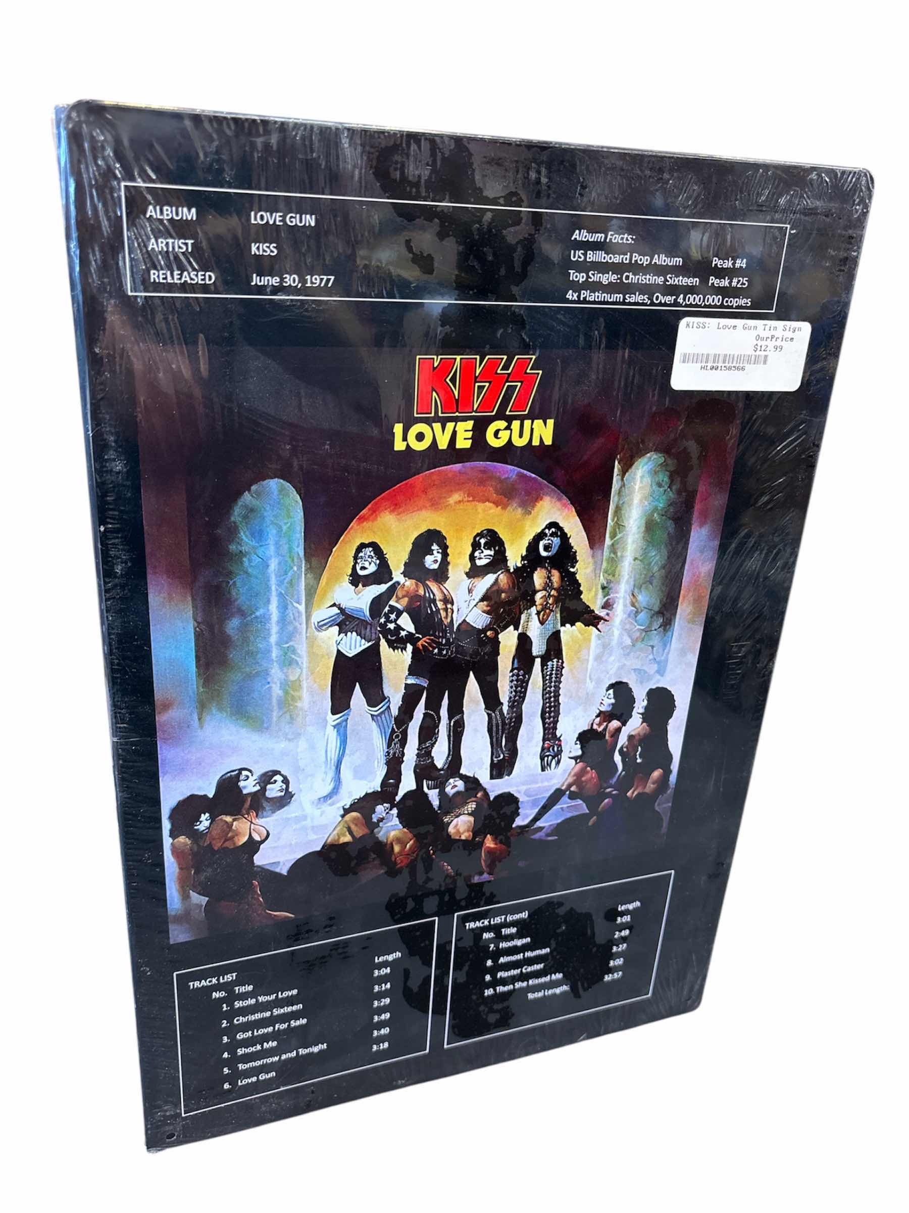 Photo 1 of NEW KISS LOVE GUN TIN SIGN 11” X 15.5”
