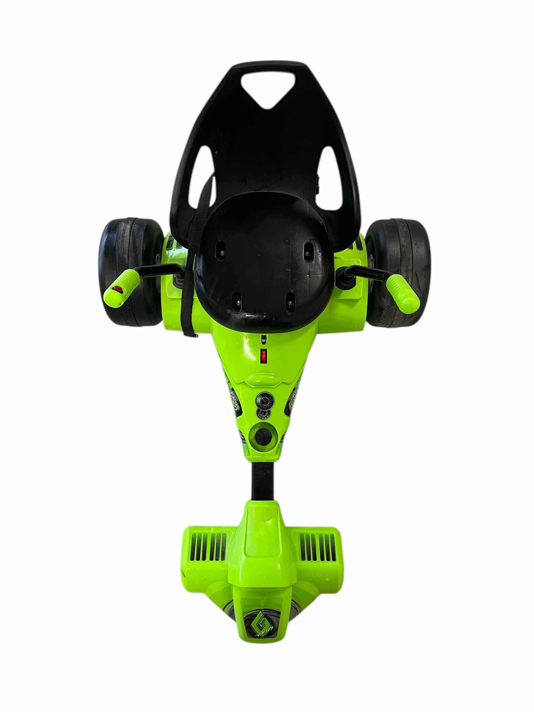 Photo 1 of HUFFY ELECTRIC GREEN MACHINE VORTEX W CHARGER