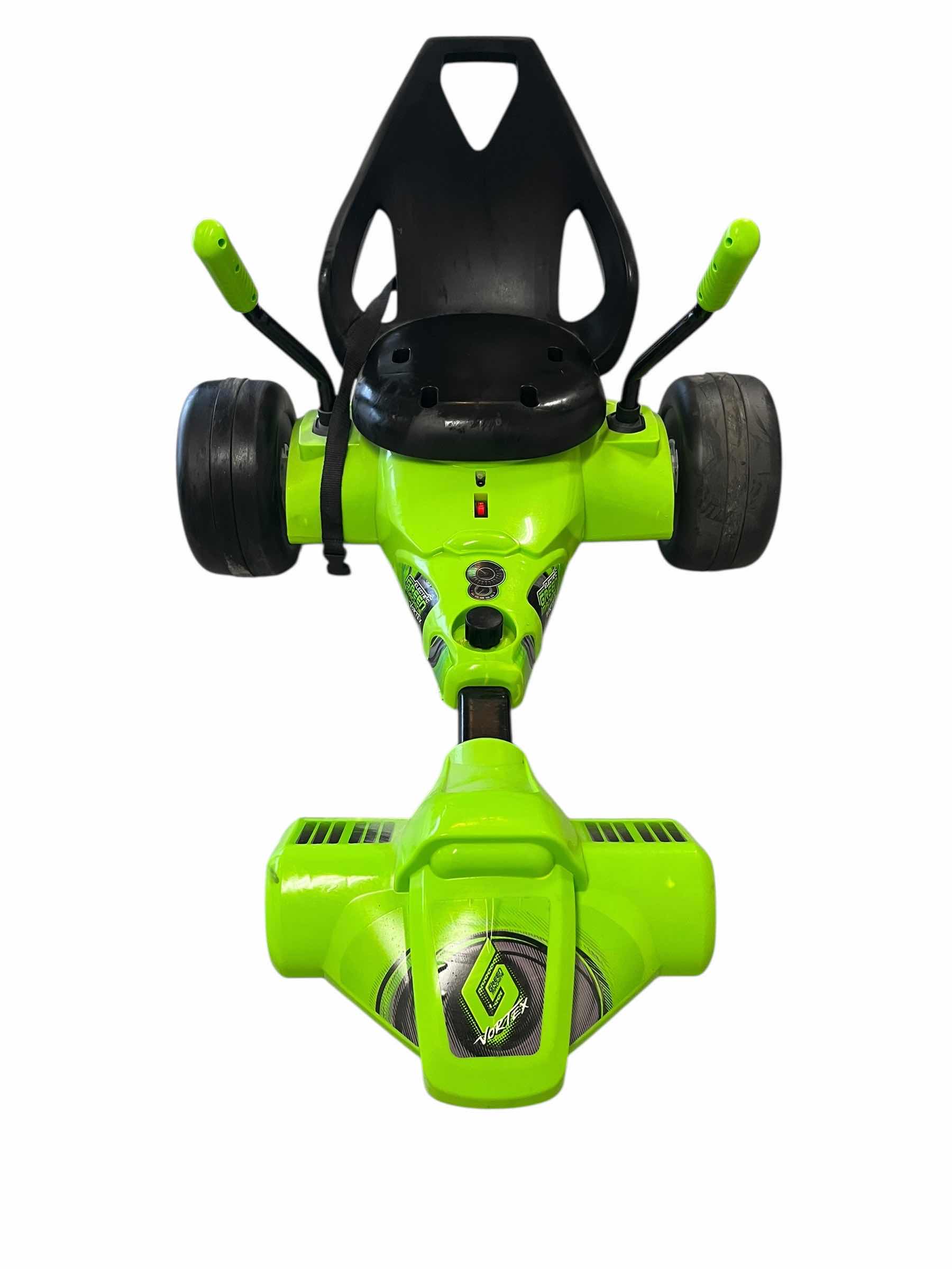Photo 1 of HUFFY ELECTRIC GREEN MACHINE VORTEX W CHARGER