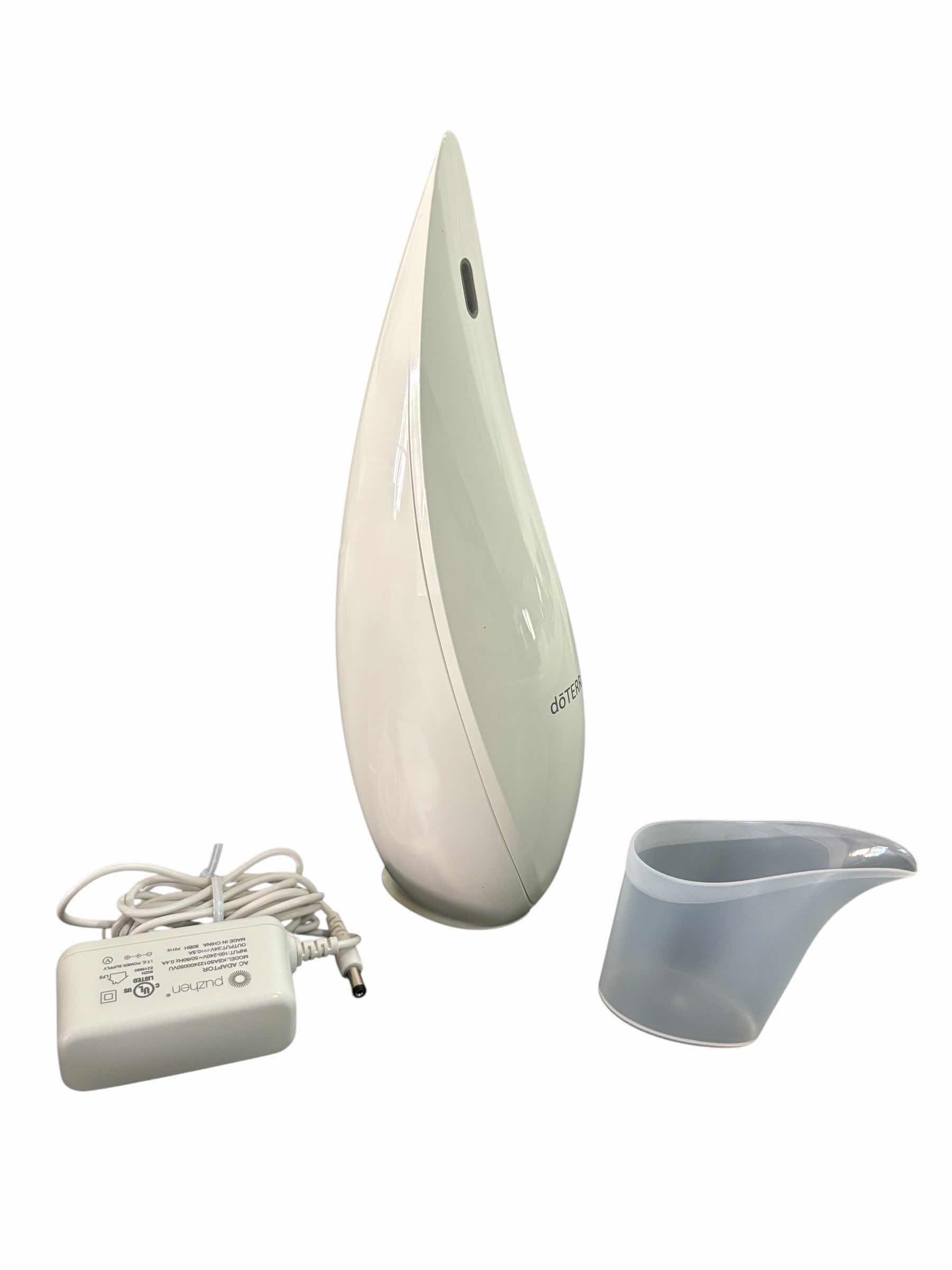 Photo 1 of DOTERRA LOTUS AROMA DIFFUSER, HAS TIMER, LED LIGHT & COVERS UP TO 330 SQ FT