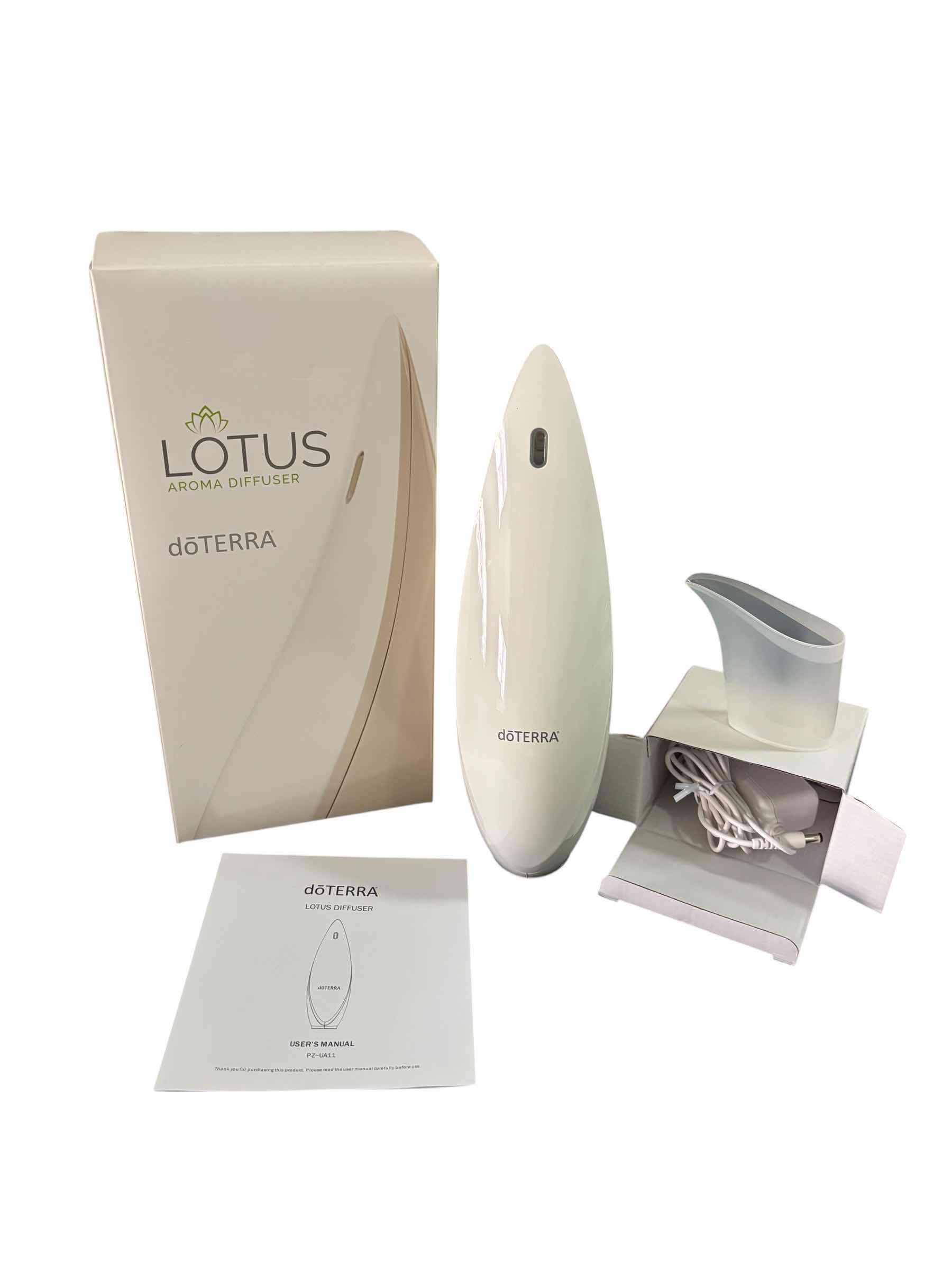 Photo 1 of DOTERRA LOTUS AROMA DIFFUSER, HAS TIMER, LED LIGHT & COVERS UP TO 330 SQ FT