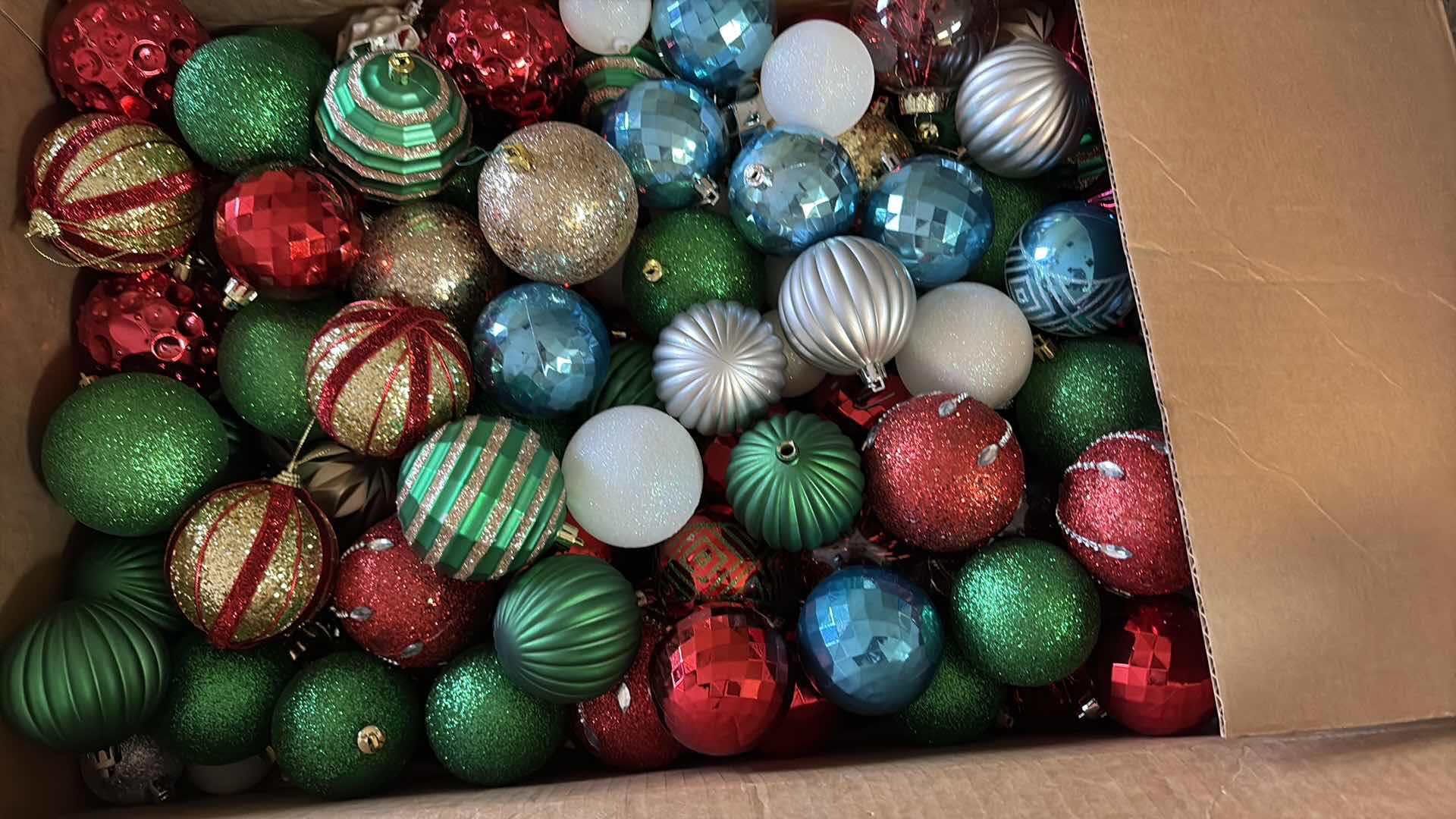 Photo 1 of (2) BOXES OF CHRISTMAS ORNAMENTS AND LARGE SIGN 24”X24”
