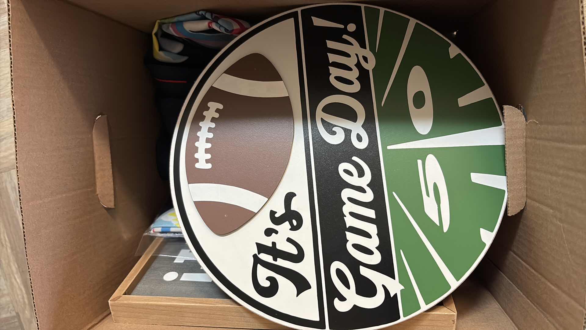 Photo 1 of SMALL BOX OF FOOTBALL DECORATIONS AND CANVAS SIGN 30”X12”