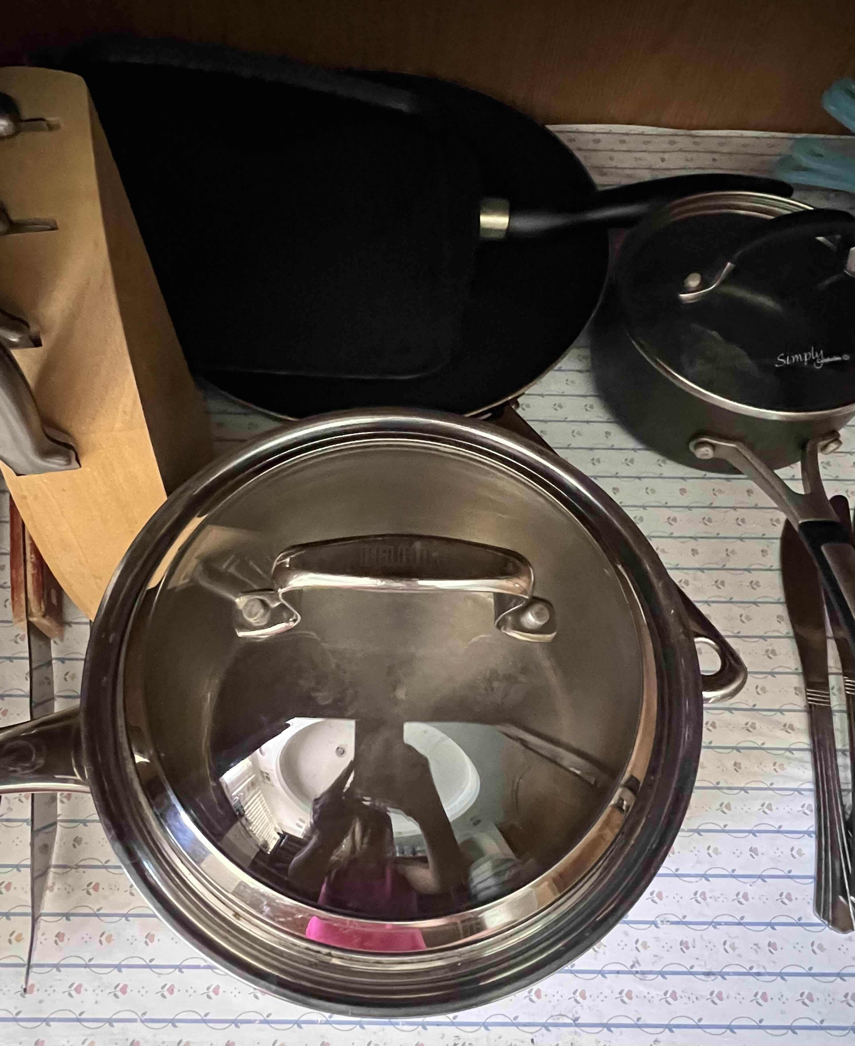 Photo 1 of CONTENTS OF KITCHEN CABINET (KITCHEN COOKWARE, FLATWARE & STEMWARE)