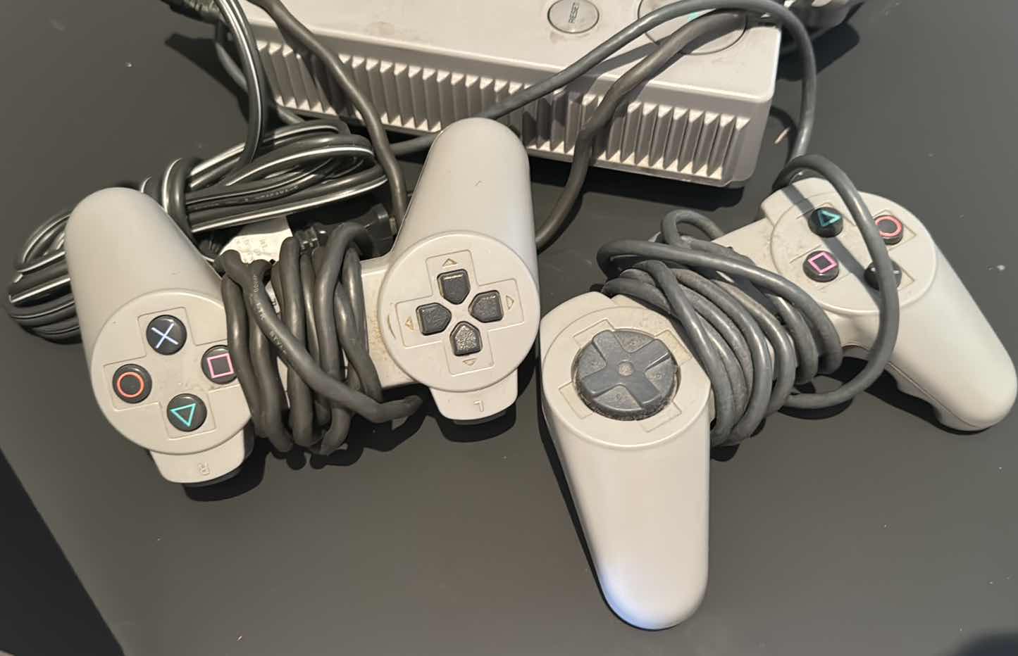 Photo 1 of SONY PLAYSTATION W 2 GAME CONTROLLERS