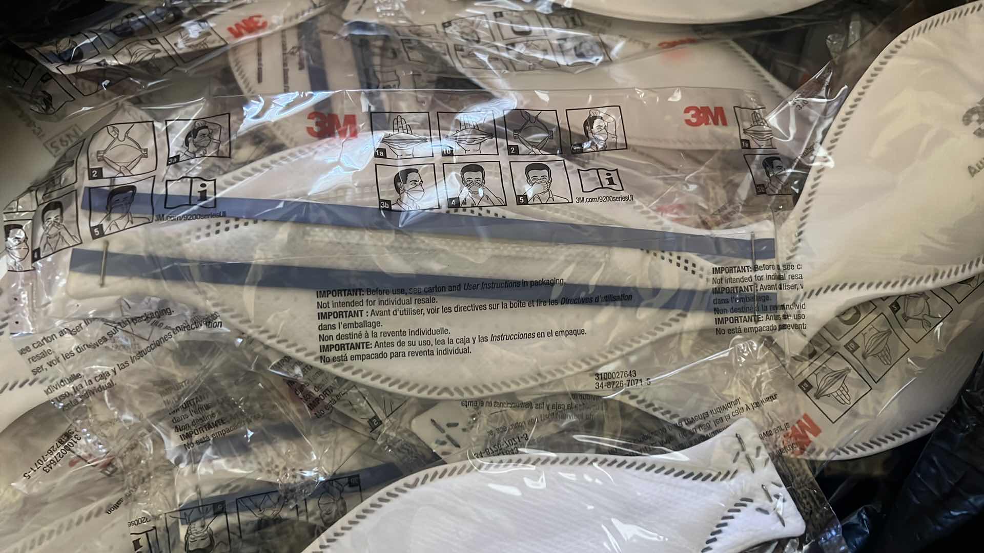 Photo 1 of BAG OF NEW 3 M FACE MASKS