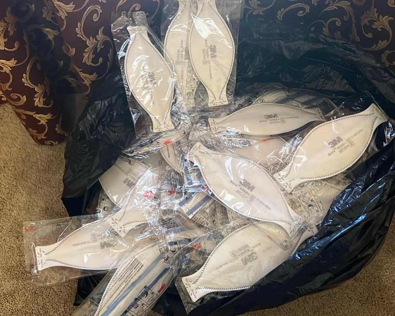 Photo 1 of BAG OF NEW 3 M FACE MASKS