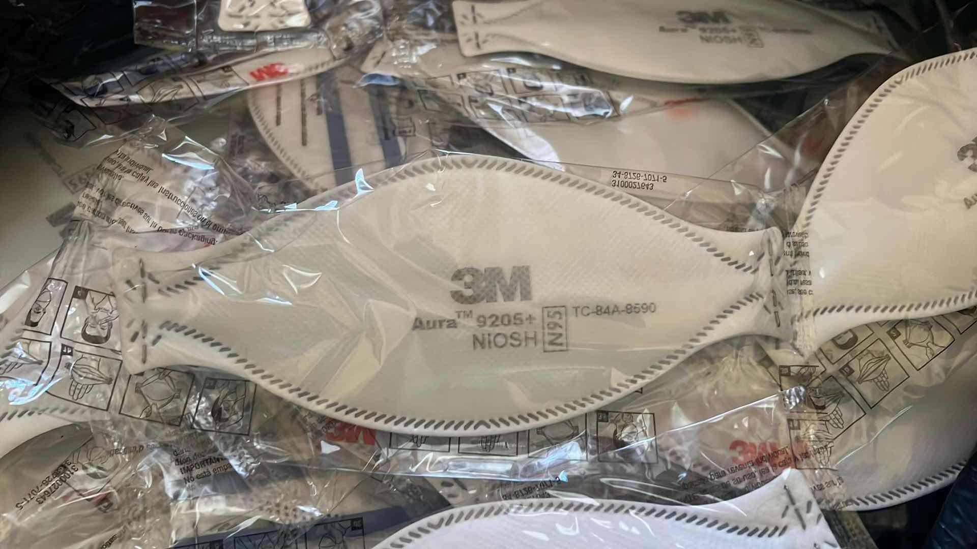Photo 1 of BAG OF NEW 3 M FACE MASKS