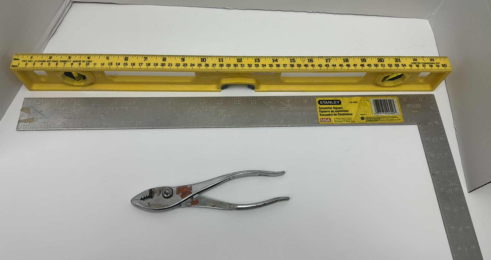 Photo 1 of CARPENTER SQUARE, PLIERS, 24” LEVEL
