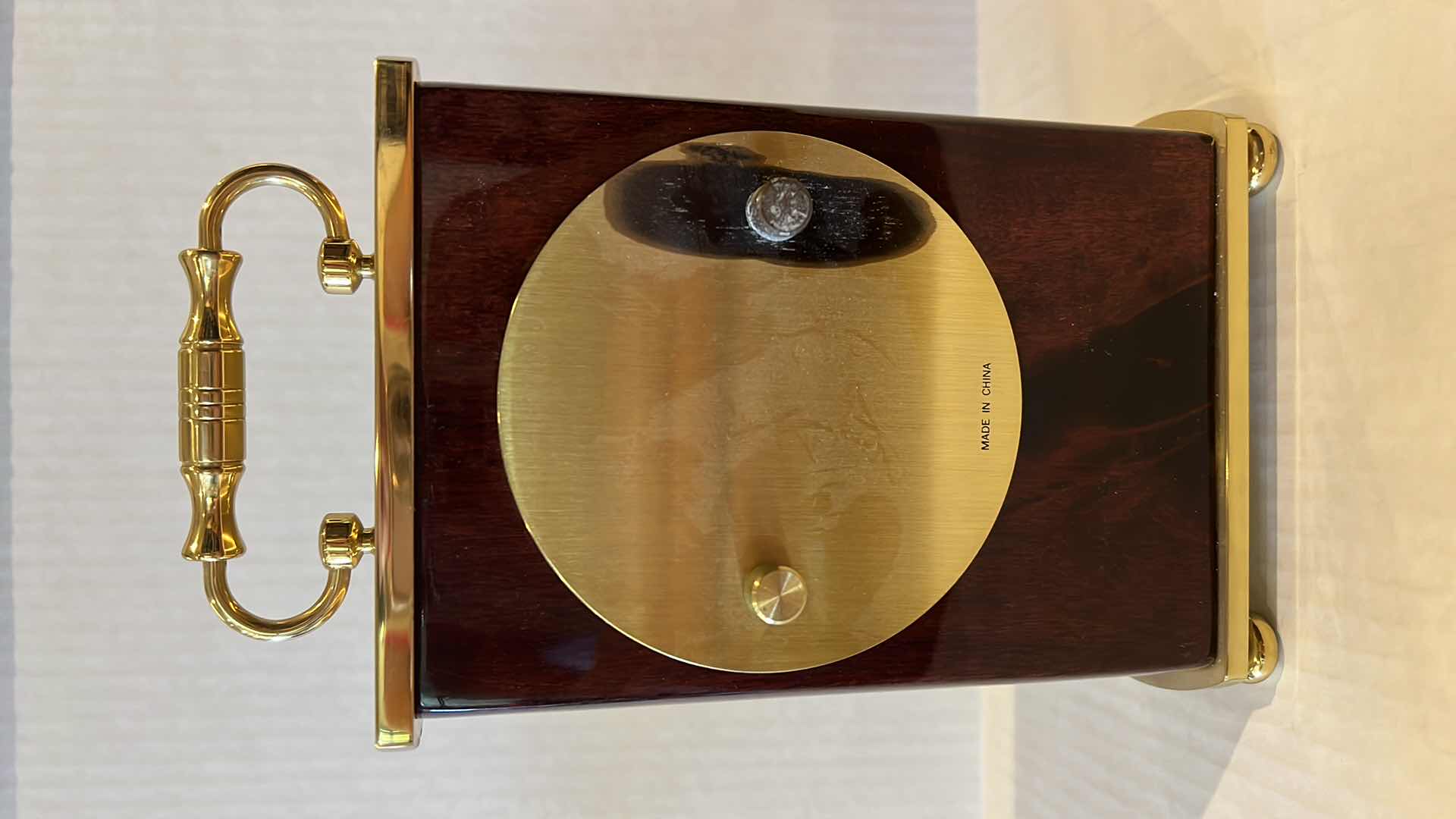 Photo 1 of MOVADO REDWOOD MANTLE CLOCK. H8.5”