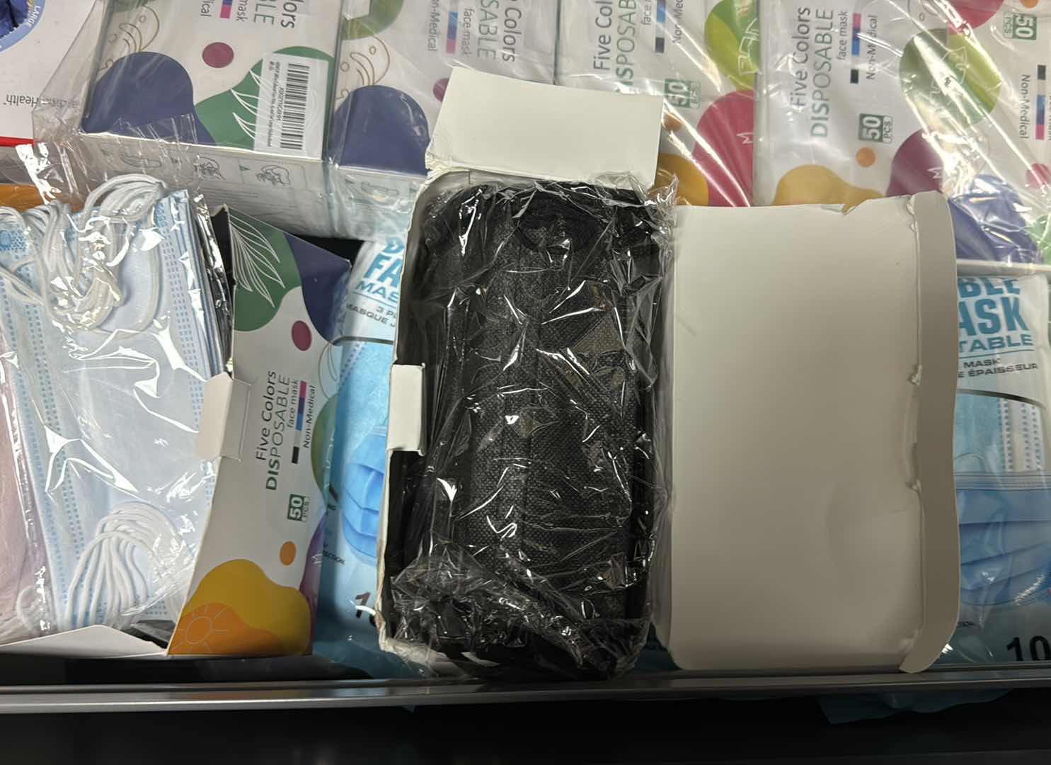 Photo 1 of CONTENTS OF DRAWER- DISPOSABLE MASKS