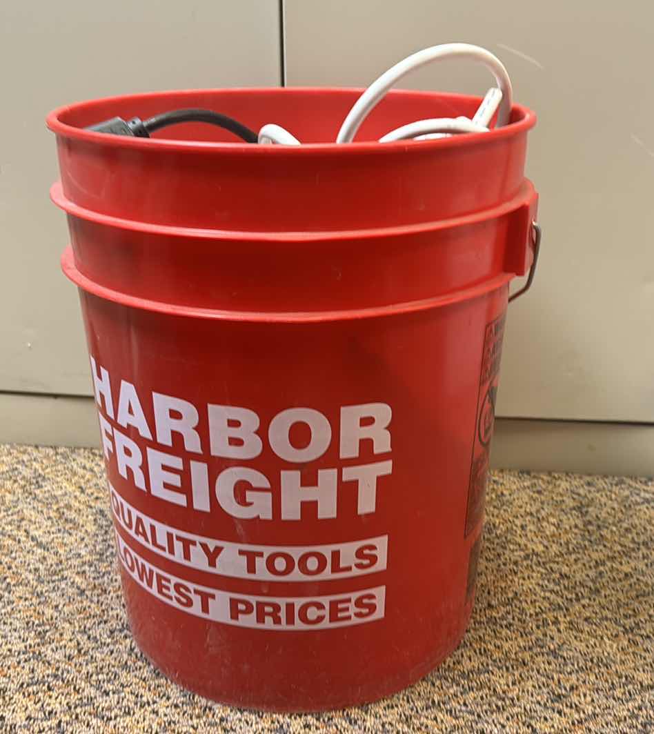 Photo 1 of FIVE GALLON BUCKET OF SURGE PROTECTORS AND EXTENSION CORDS