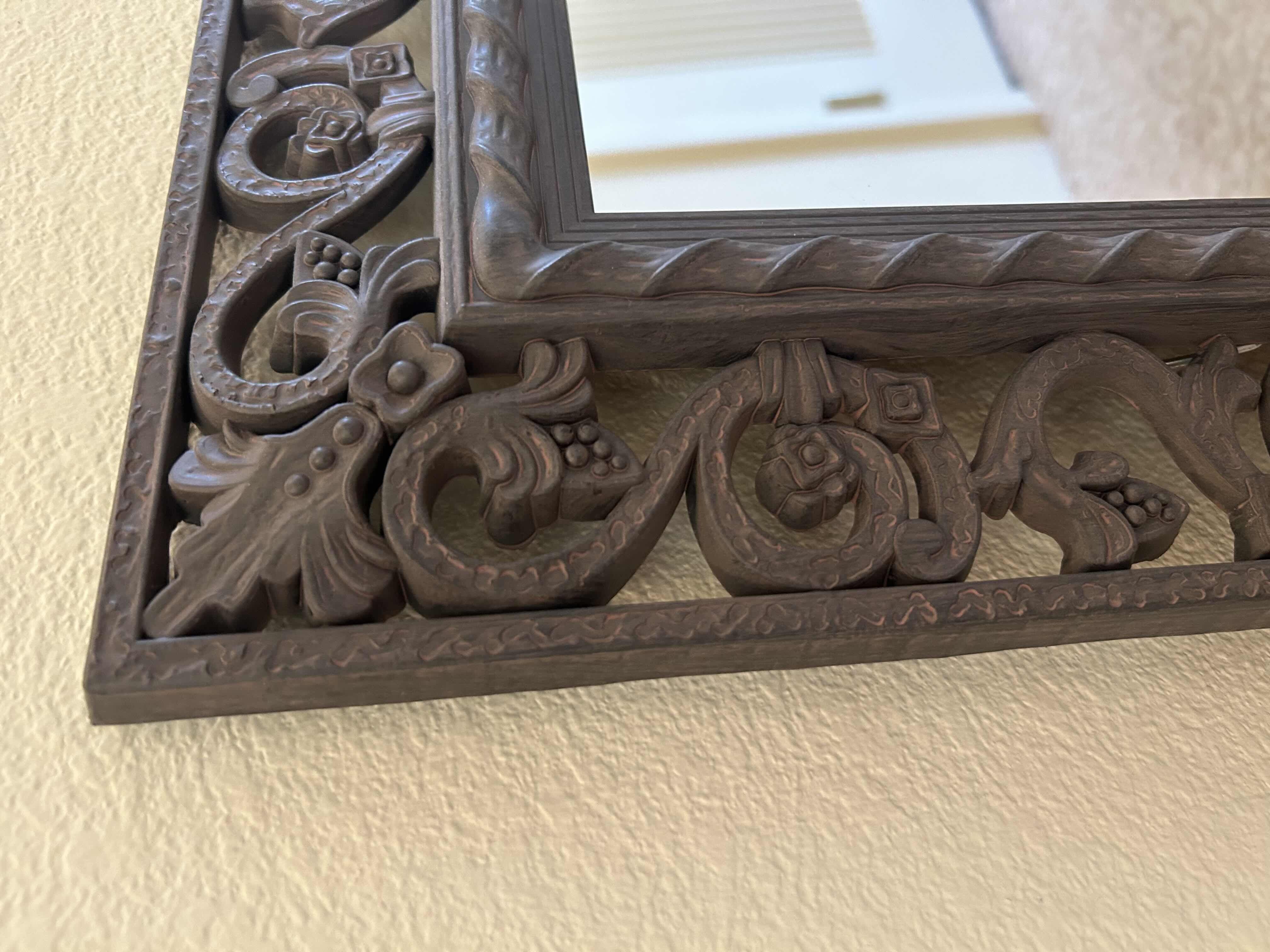 Photo 1 of BEVELED PLASTIC FILIGREE MIRROR 
25” X 36” H