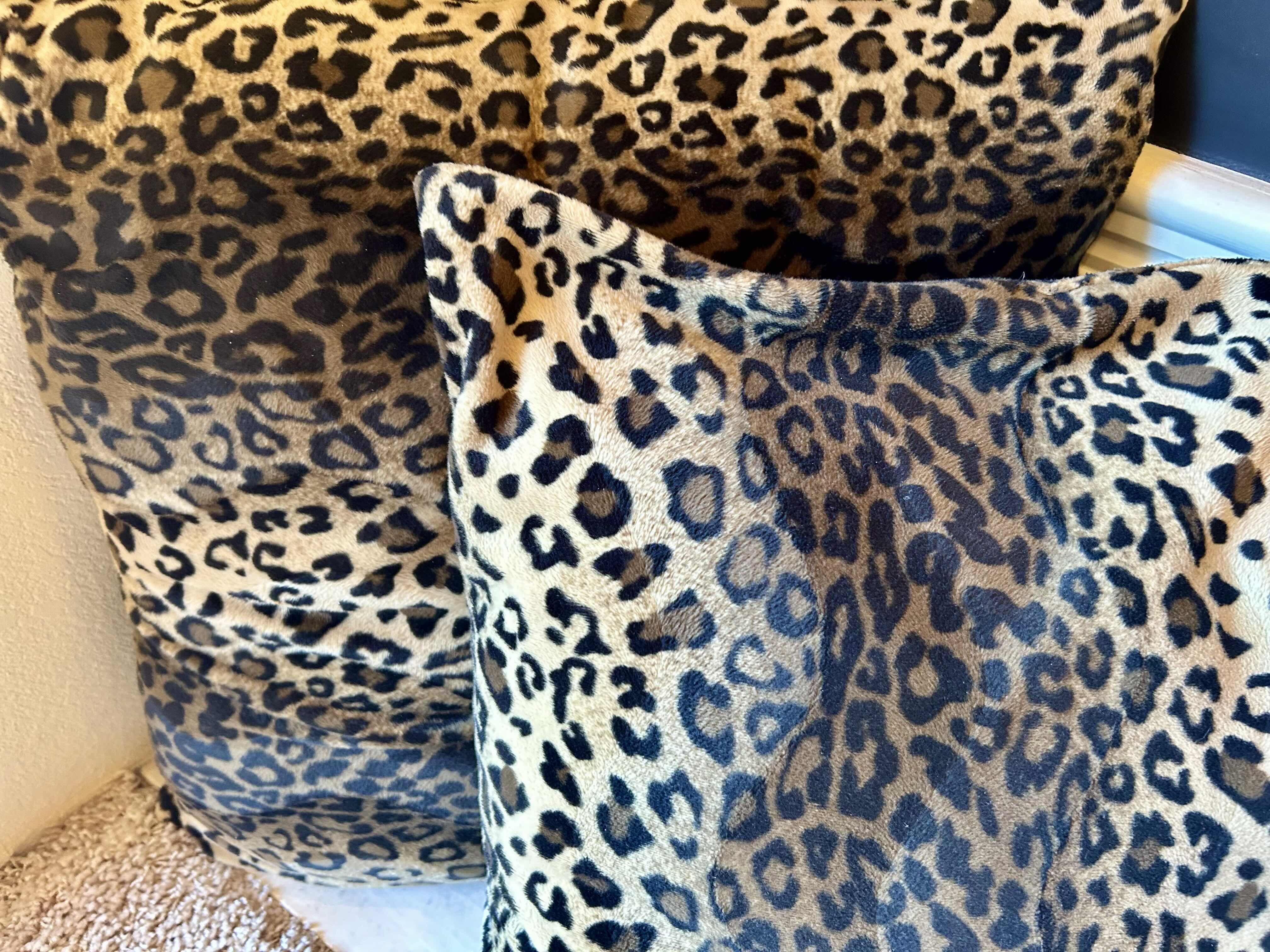 Photo 1 of 3 DECORATIVE ACCENT PILLOWS: (2) LEOPARD PRINT 20”X 24” AND (1) BIEGE ACCENT PILLOW 18” X 20”