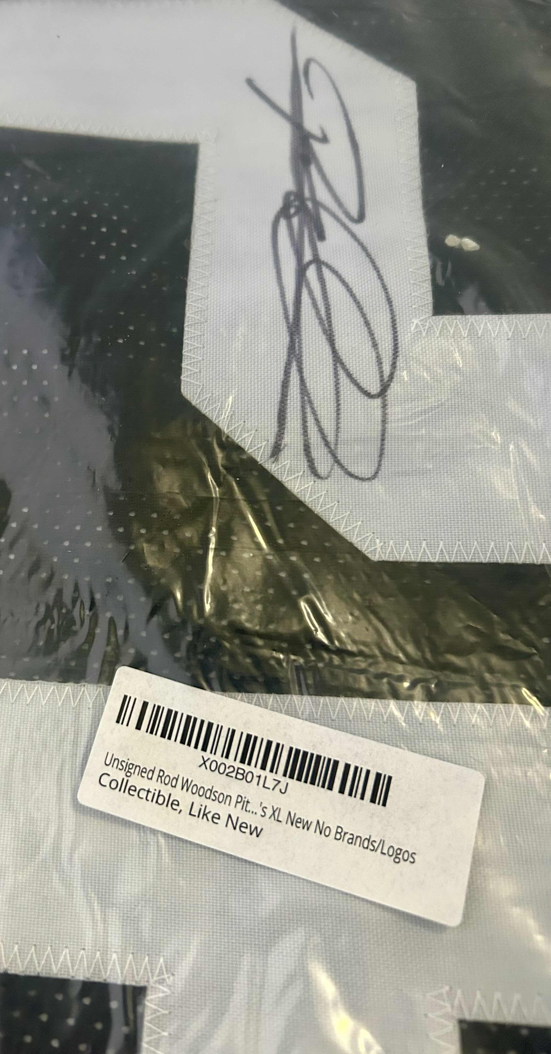 Photo 1 of AUTOGRAPHED ROD WOODSON “26” NFL JERSEY
