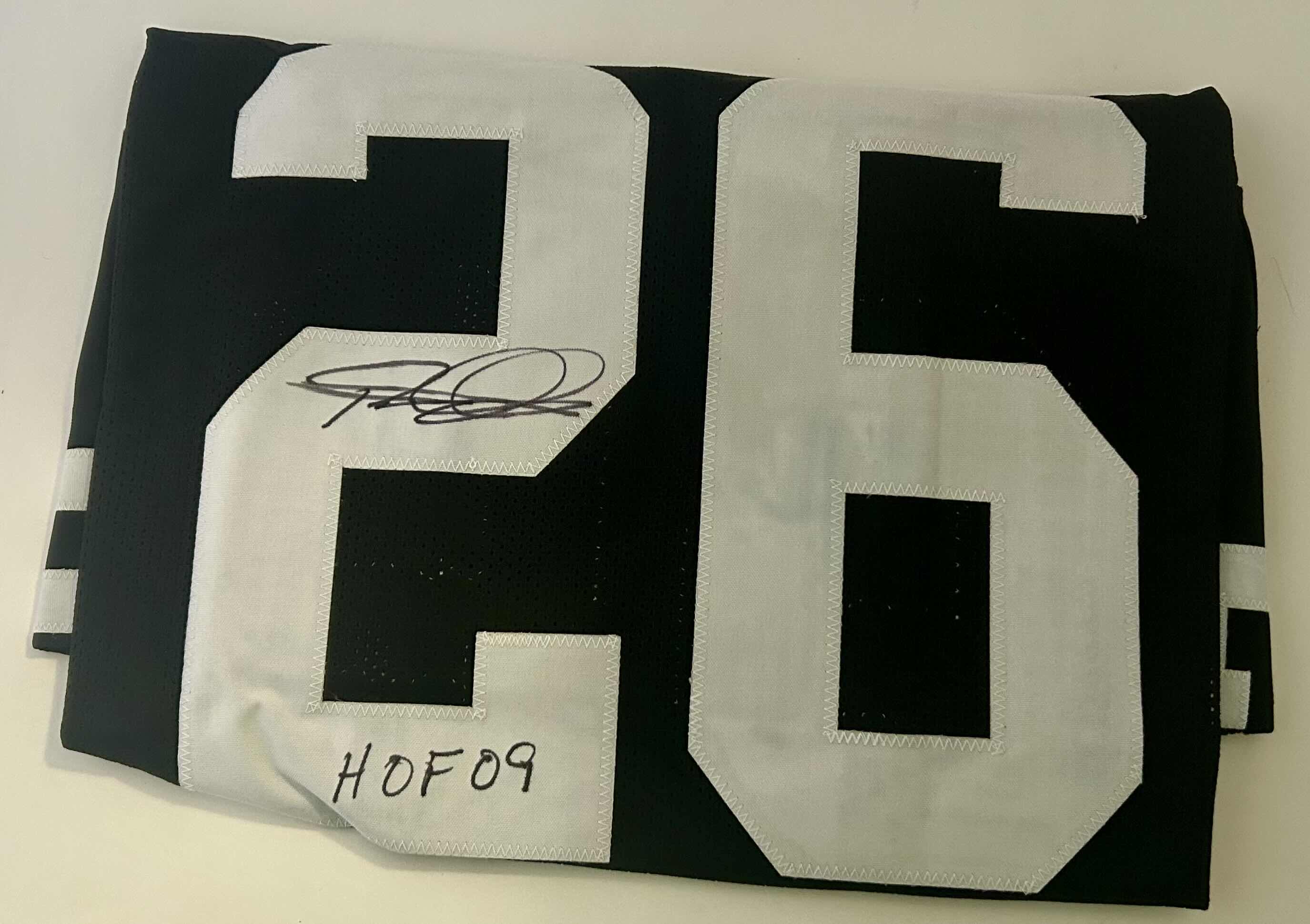 Photo 1 of AUTOGRAPHED ROD WOODSON “26” NFL JERSEY