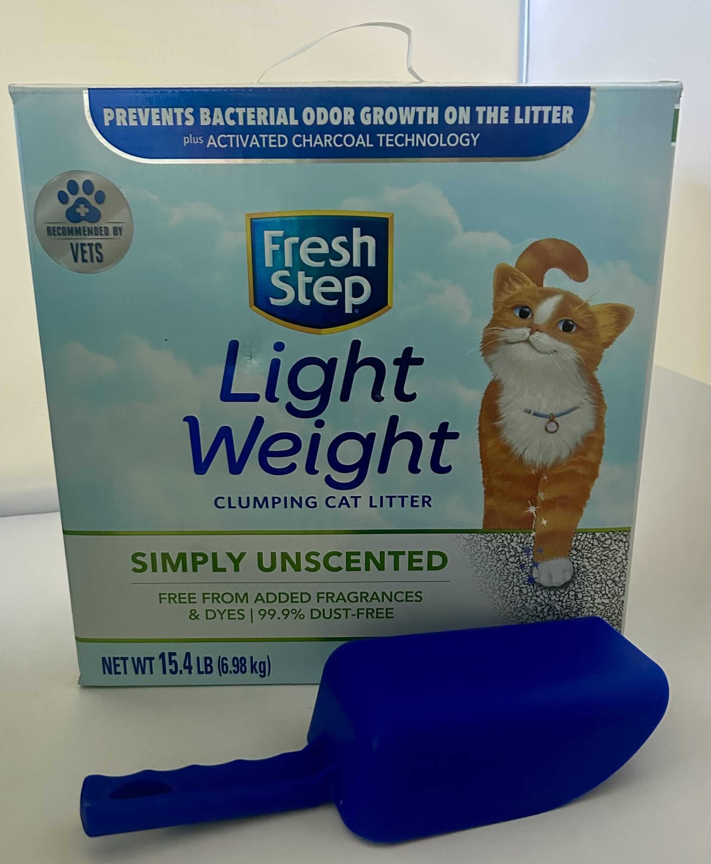 Photo 1 of 2- 15.4lb FRESH STEP SIMPLY UNSCENTED CLUMPING CAT LITTER AND BLUE SCOOP 