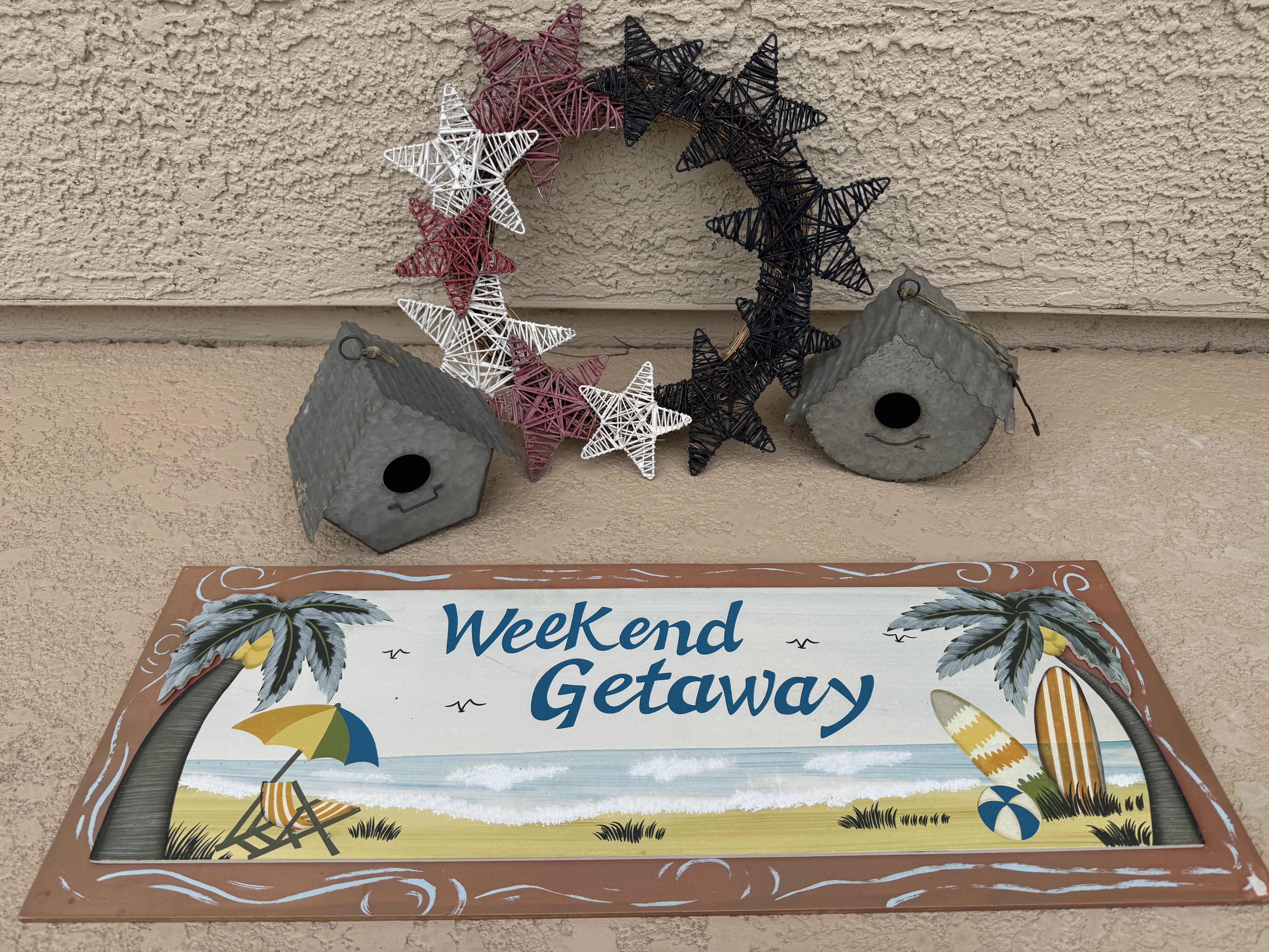 Photo 1 of 4- OUTDOOR ESSENTIALS, SIGN IS 26” X 10”