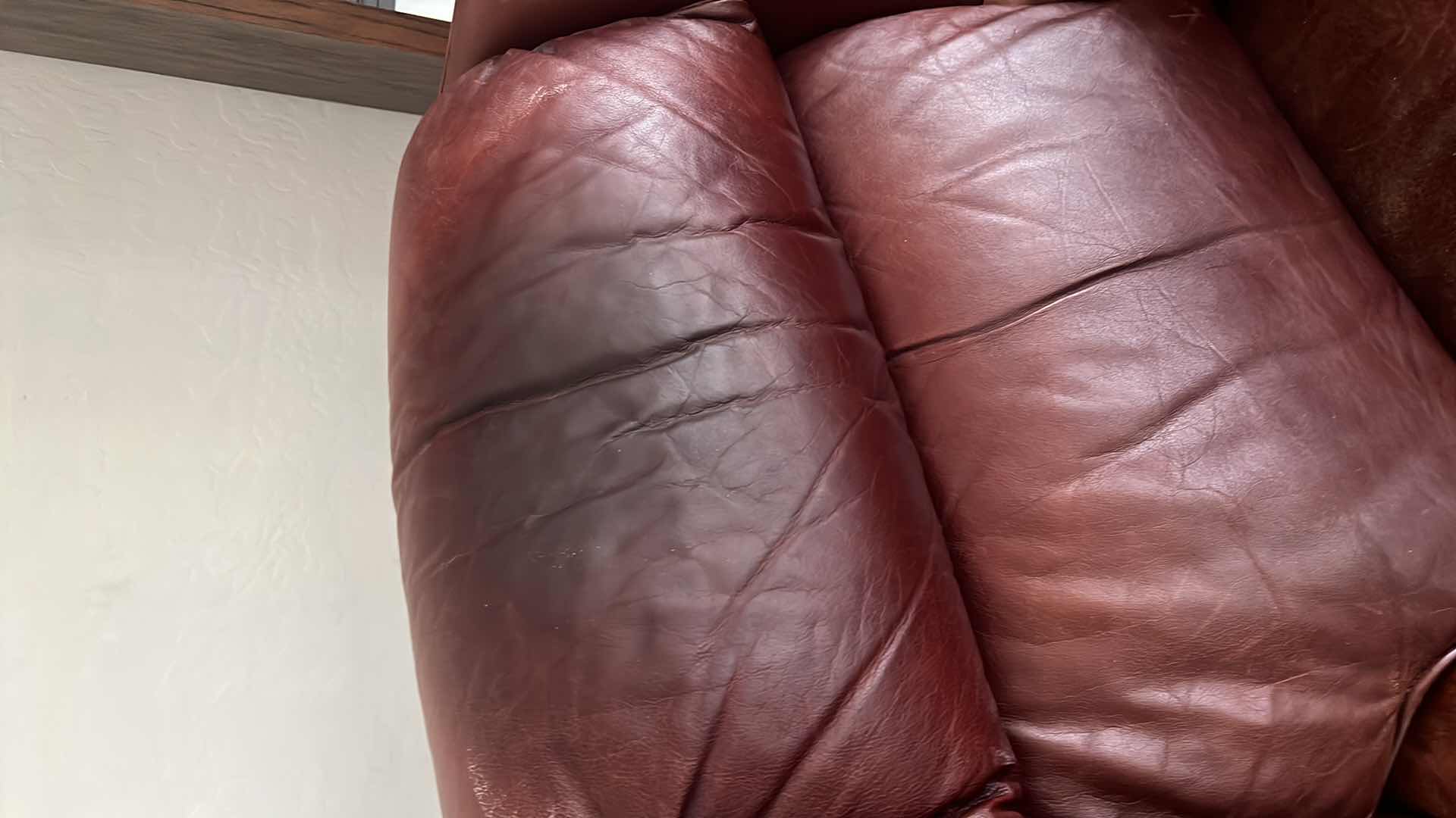 Photo 2 of USED LEATHER ARMCHAIR 1 OF 2 IN SET (SOLD SEPARATELY).