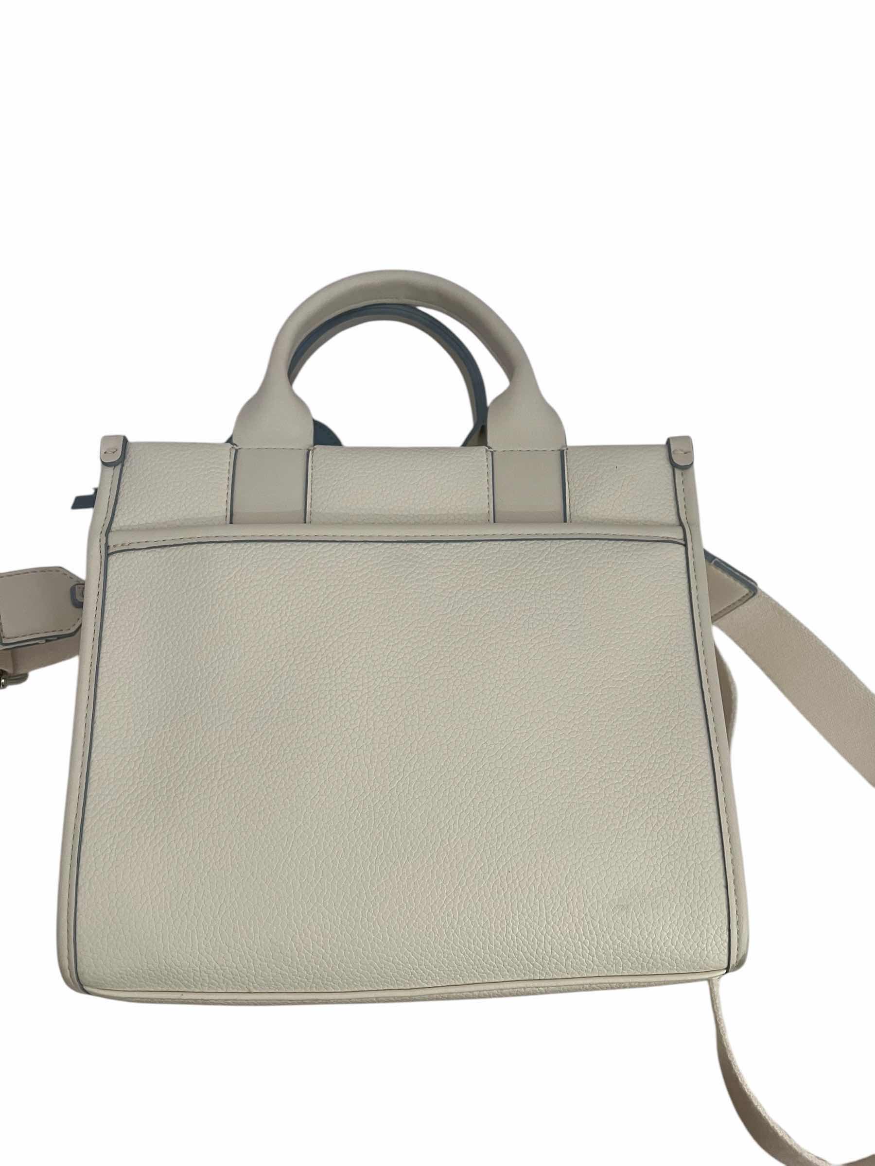 Photo 1 of CALVIN KLEIN LEATHER HAND BAG-WHITE WITH TEAL STITCHING.