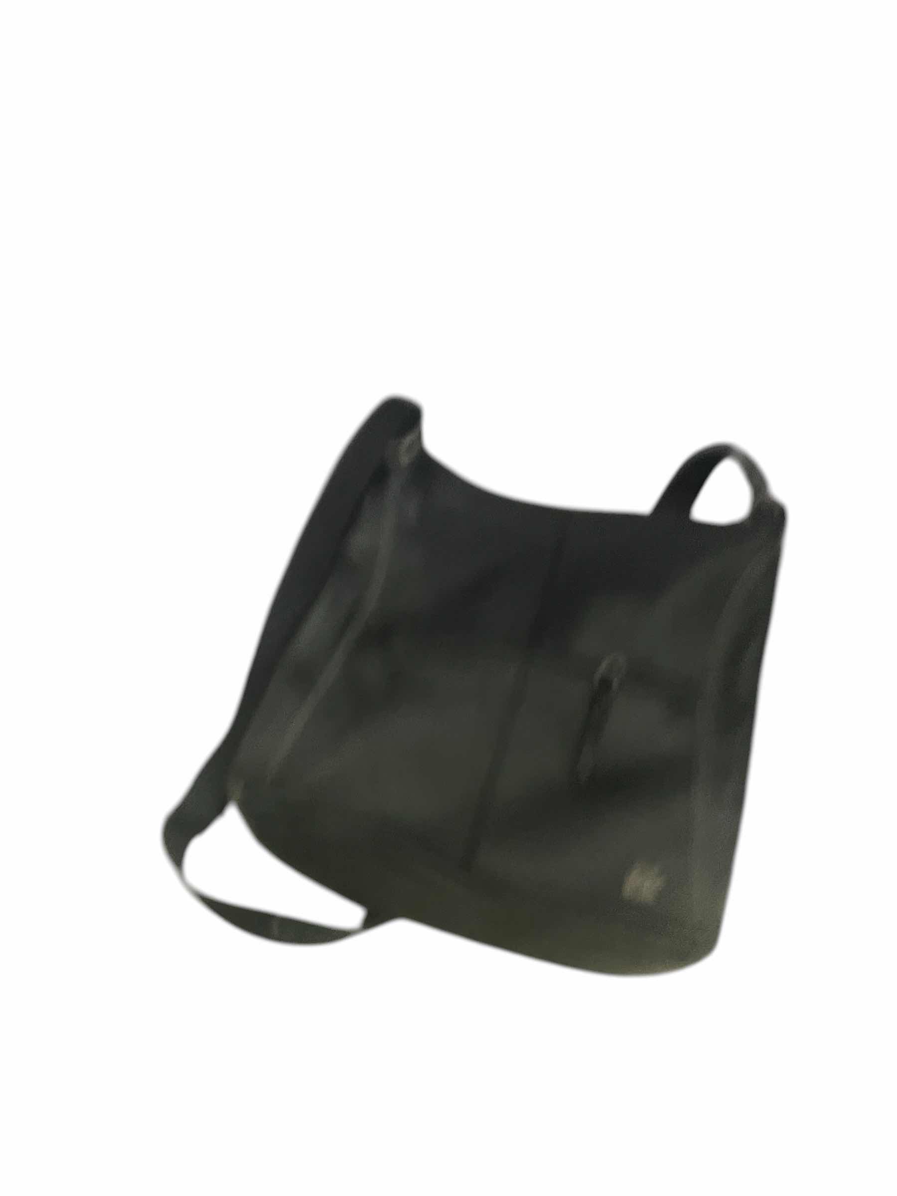 Photo 1 of 2- DESIGNER PURSES. WHITE "CALVIN KLEIN" AND  BLACK "THE SAK" BAGS.