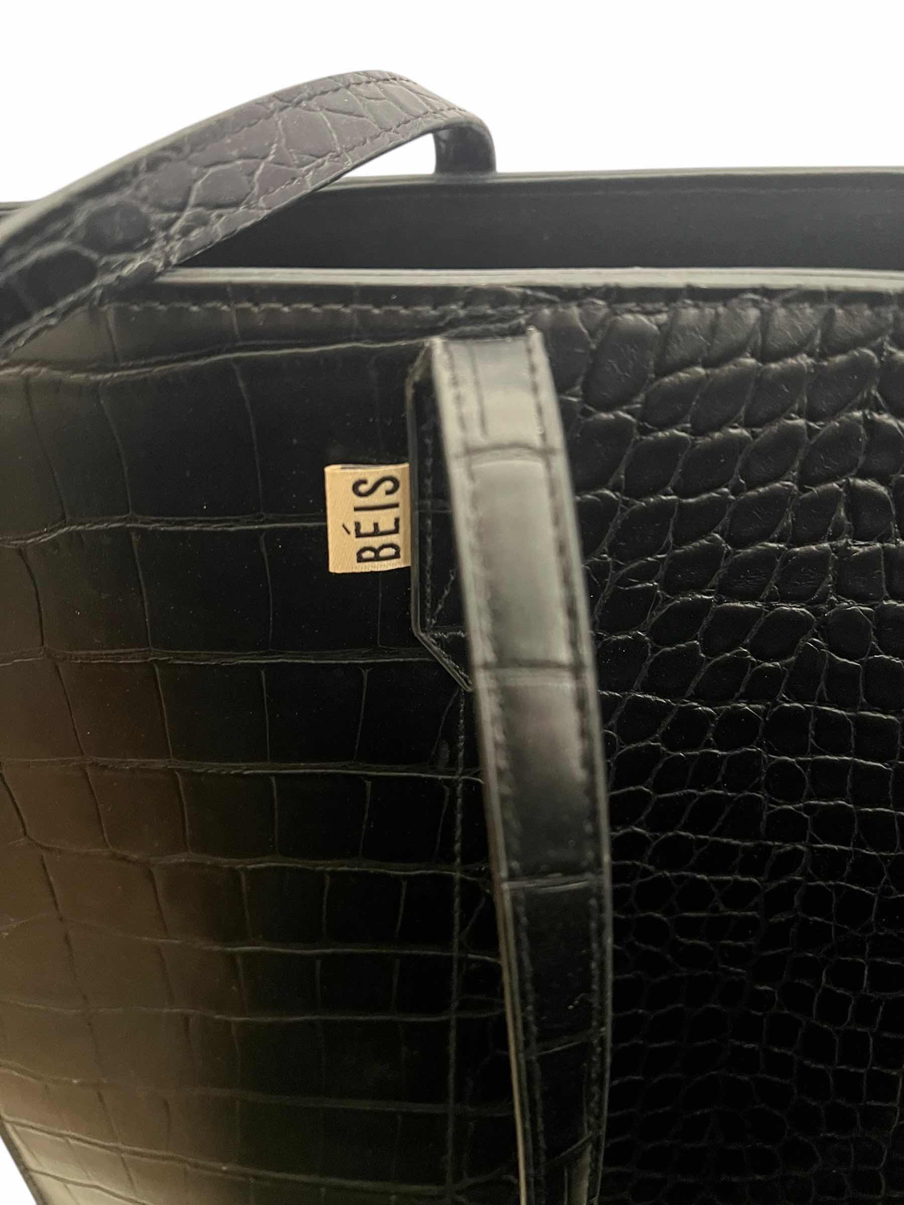 Photo 1 of TWO BLACK LEATHER AND PATTEN LEATHER COMPUTER TOTES