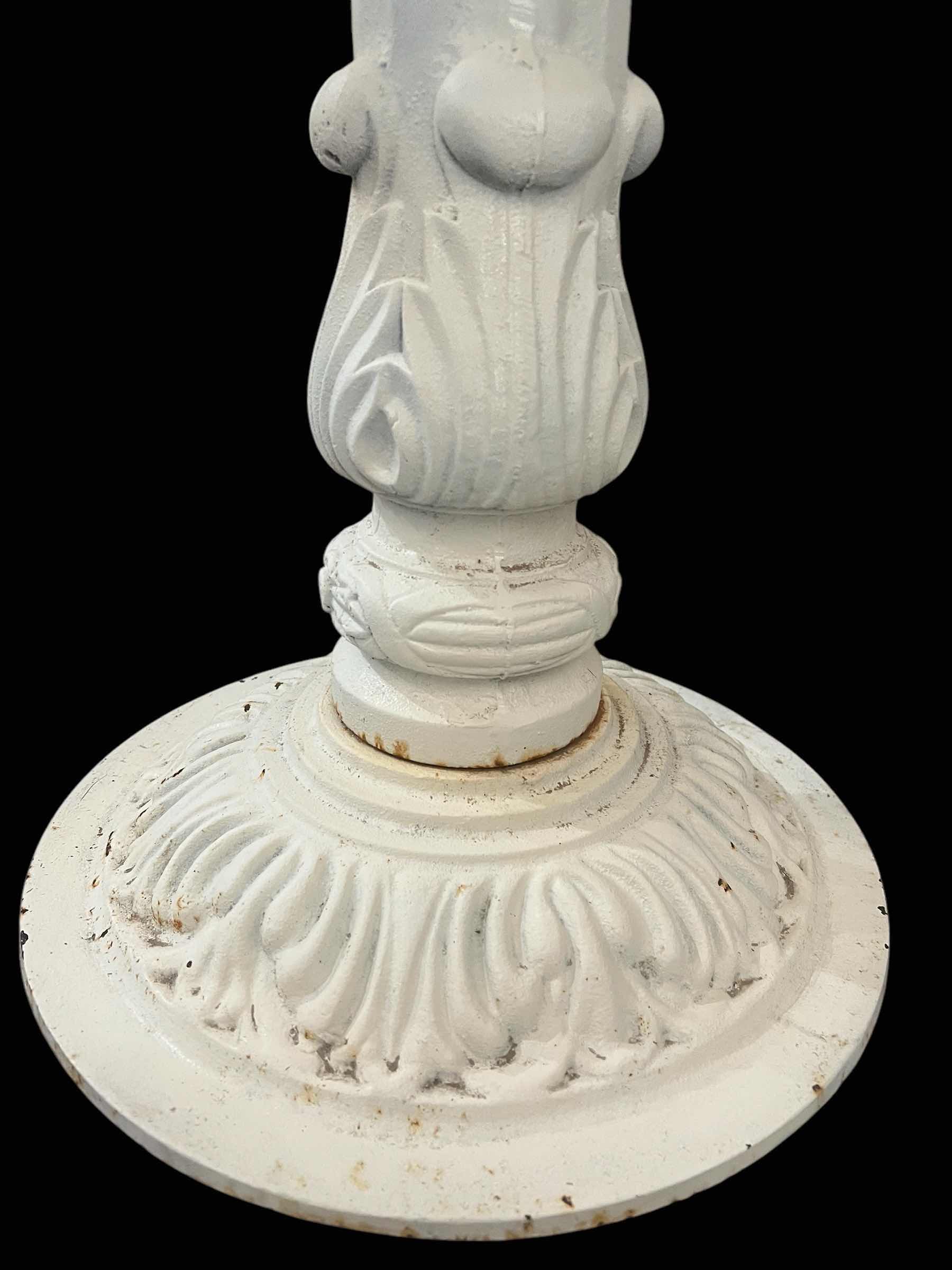 Photo 1 of WHITE ROUND TABLE. WITH WHITE METAL BASE, AND WOODEN TOP.