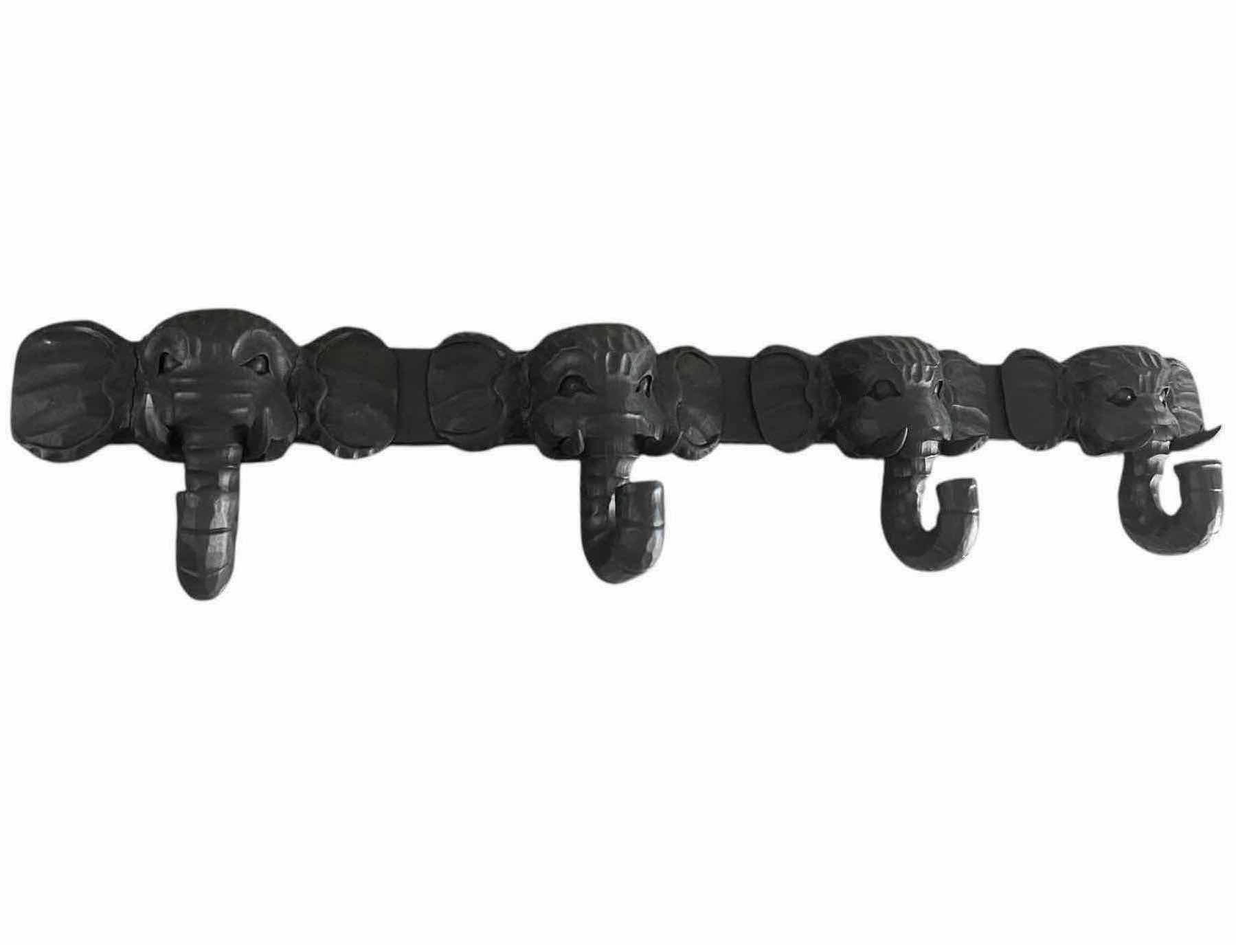 View 1 of HOME DECOR- BLACK CARVED WOODEN ELEPHANT WALL HANGER 40”