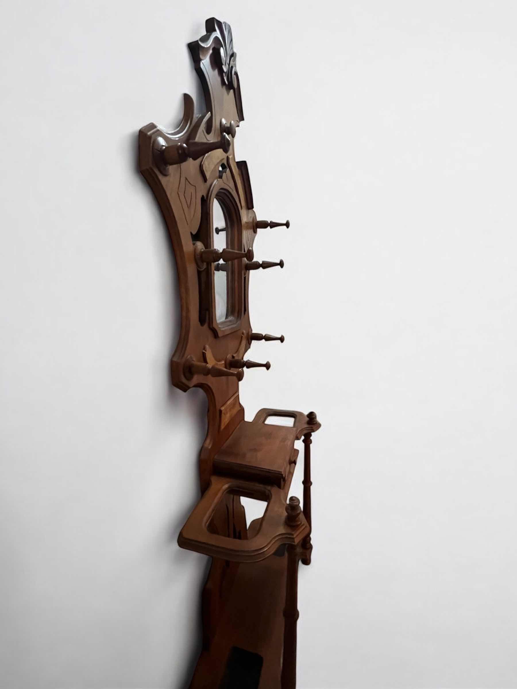 Photo 1 of VINTAGE WOODEN COAT AND UMBRELLA RACK. 3' X 7'H.